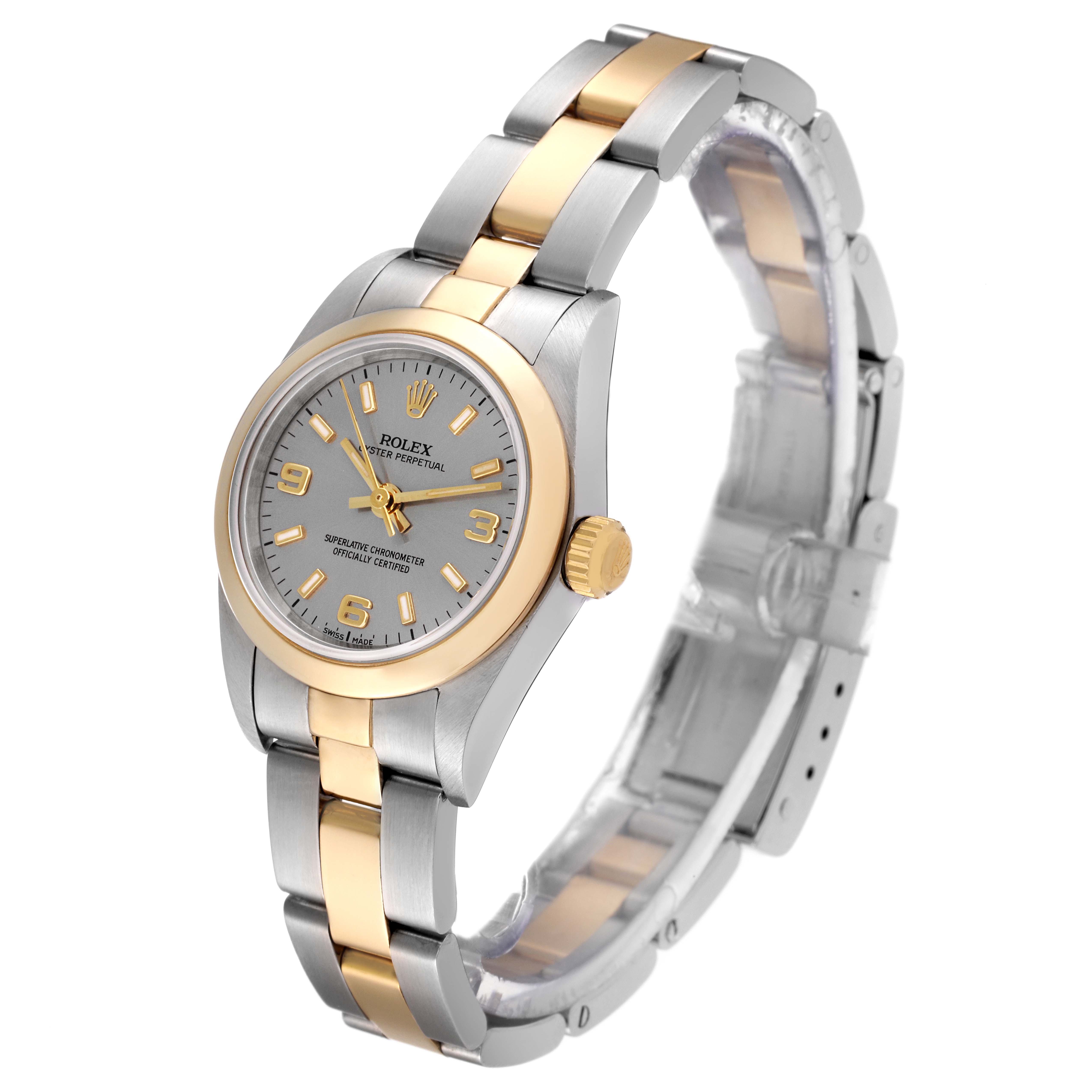 The image shows a Rolex Oyster Perpetual 76183 Women's Steel and Gold (two tone) Grey Dial 76183 Women's Steel and Gold (two tone) Grey Dial watch angled from the front-left, highlighting the face, crown, and two-tone bracelet.