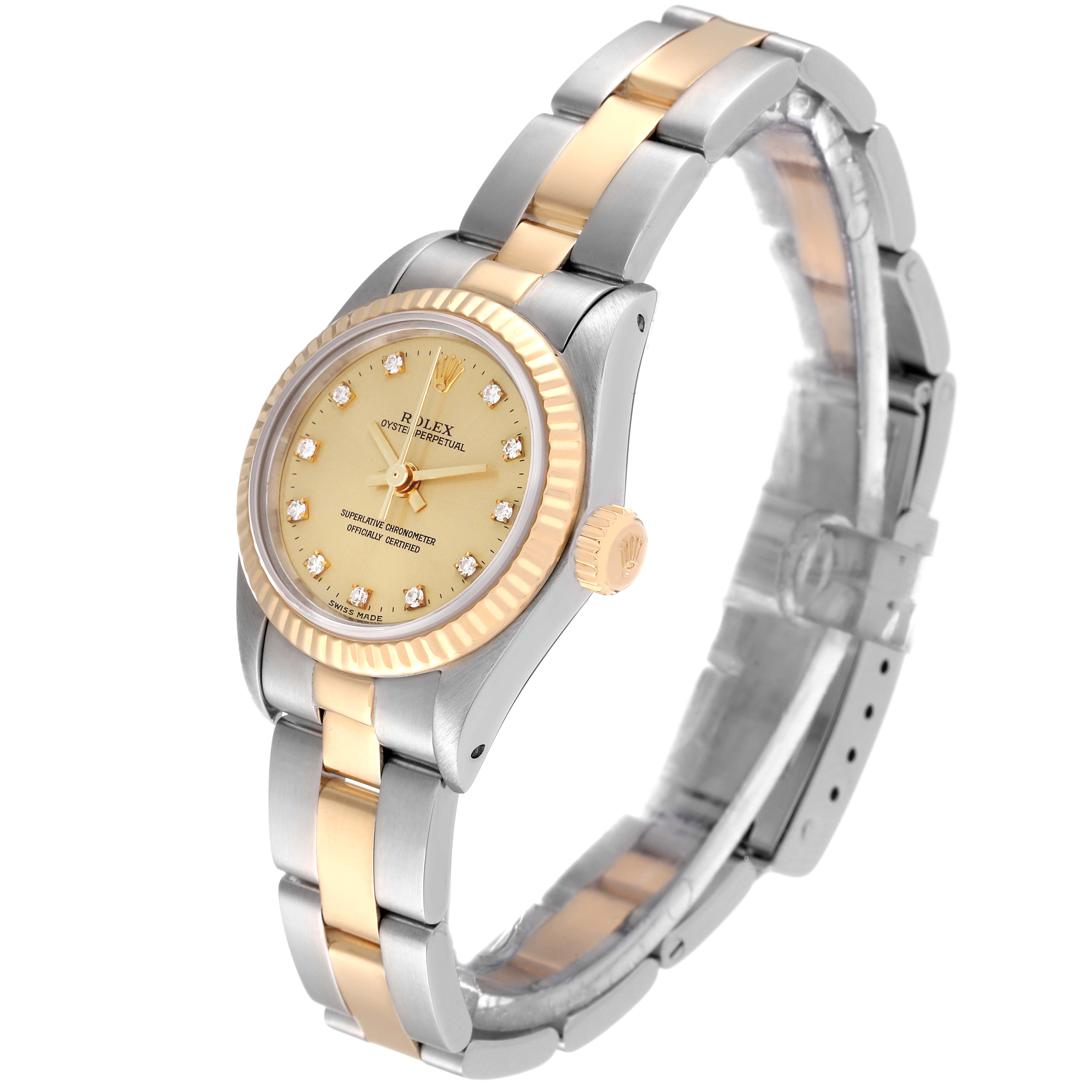 The Rolex Oyster Perpetual 67193 Women's Steel and Gold (two tone) Champagne Dial 67193 Women's Steel and Gold (two tone) Champagne Dial watch is shown at a slight angle, revealing the face, bezel, crown, and bracelet.