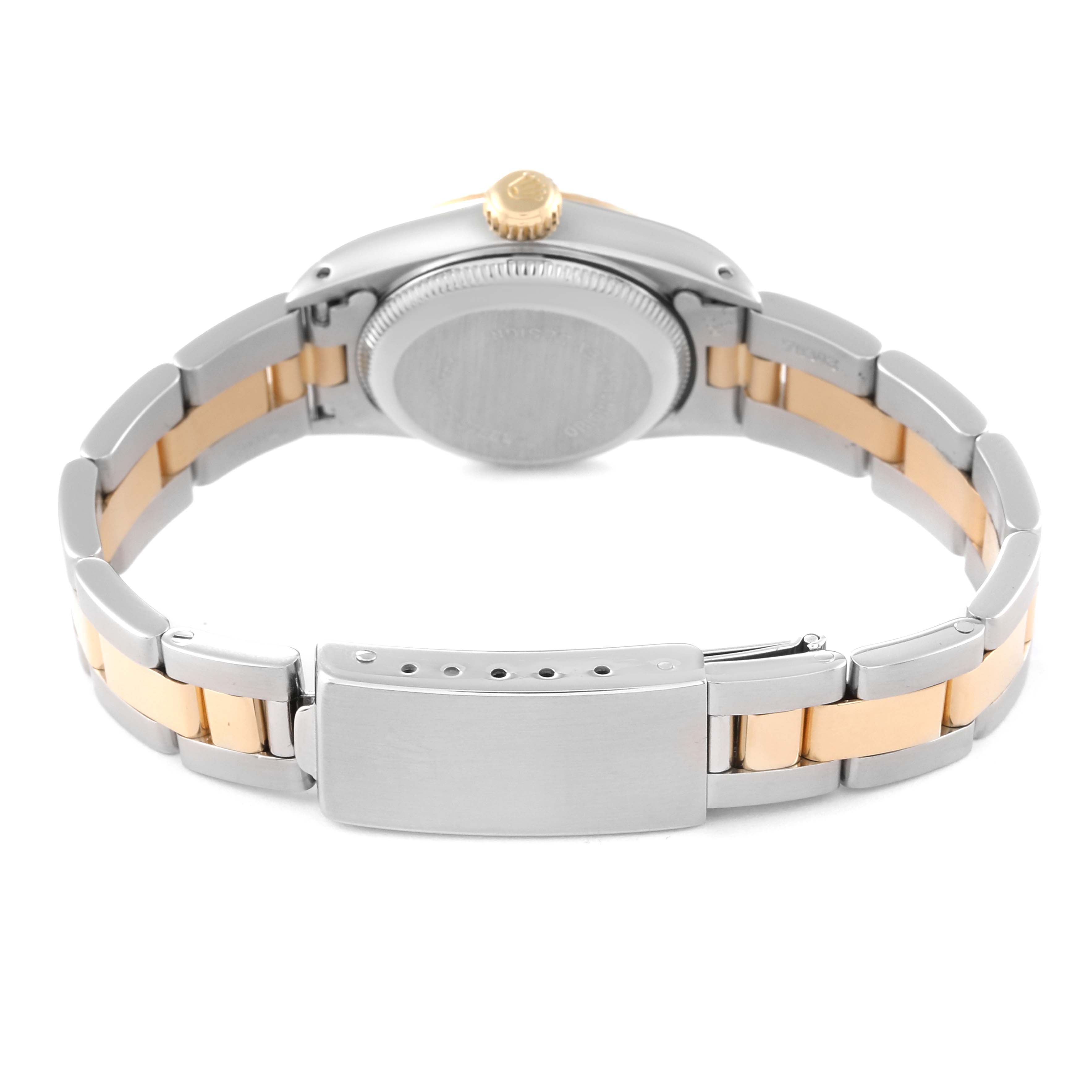 This image shows the back view of a Rolex Oyster Perpetual 67193 Women's Steel and Gold (two tone) Champagne Dial 67193 Women's Steel and Gold (two tone) Champagne Dial watch, focusing on the clasp and bracelet.
