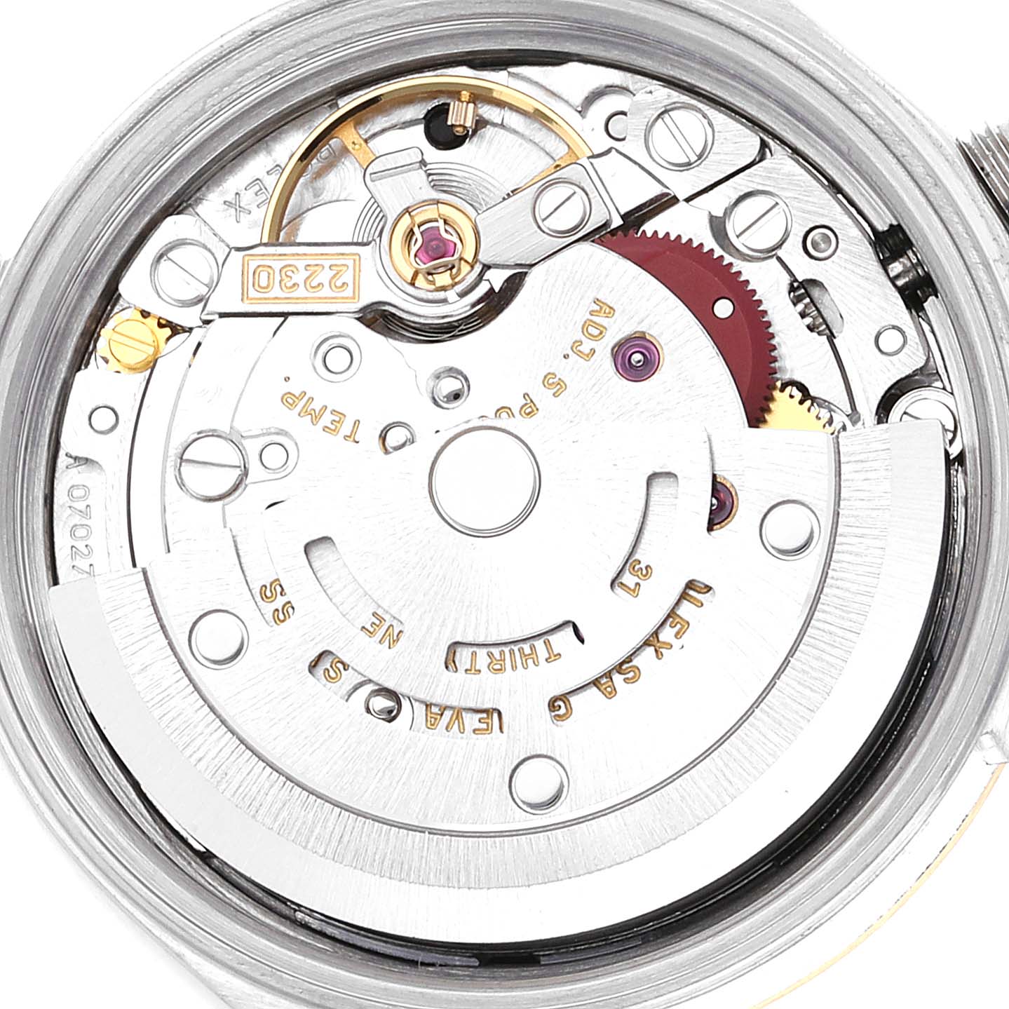 This image shows the intricate inner mechanism of a Rolex Oyster Perpetual 76193 Women's Steel and Gold (two tone) Black Dial 76193 Women's Steel and Gold (two tone) Black Dial watch viewed from the back.