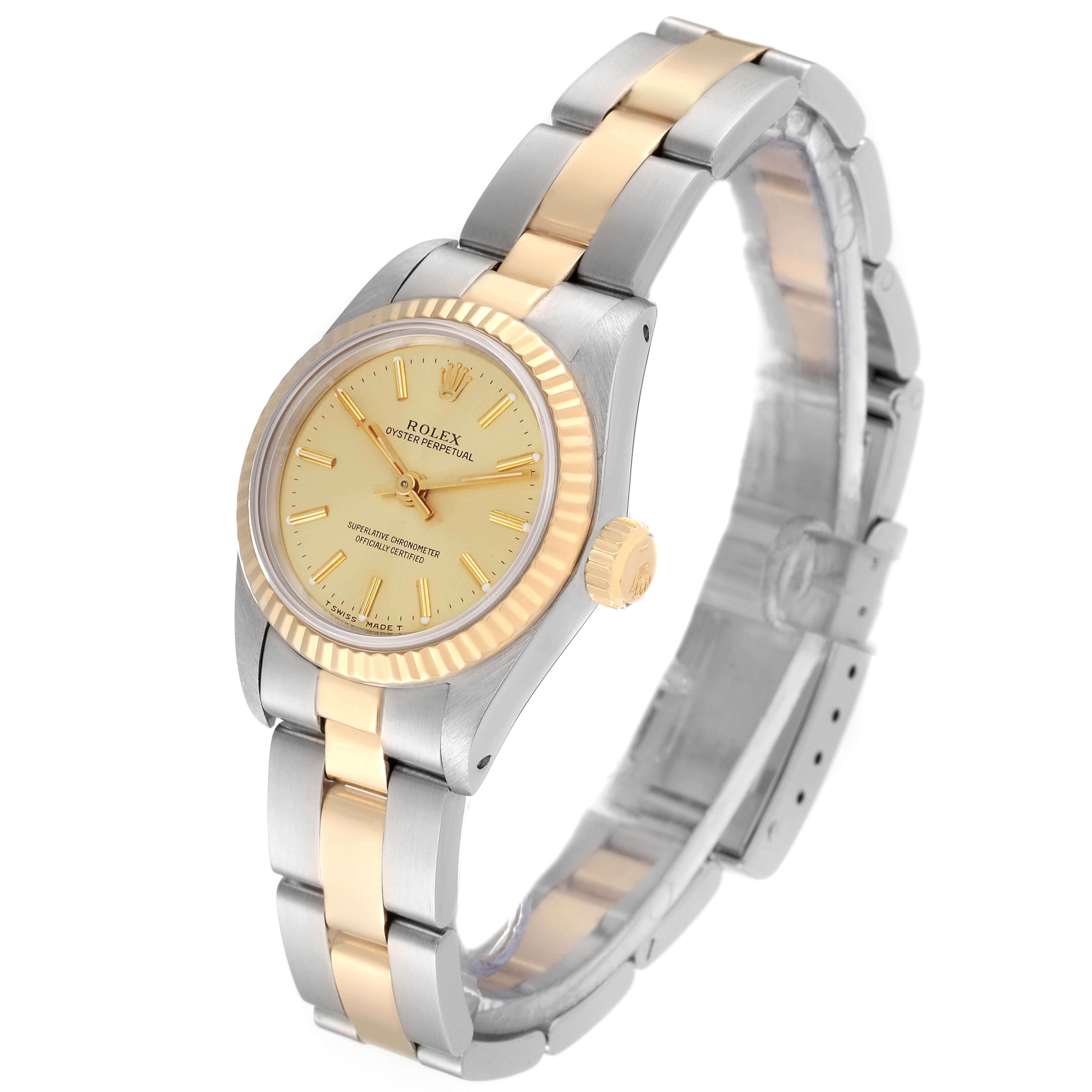 The Rolex Oyster Perpetual 67193 Women's Steel and Gold (two tone) Champagne Dial 67193 Women's Steel and Gold (two tone) Champagne Dial watch is shown at a slight angle, displaying its face and two-tone bracelet.
