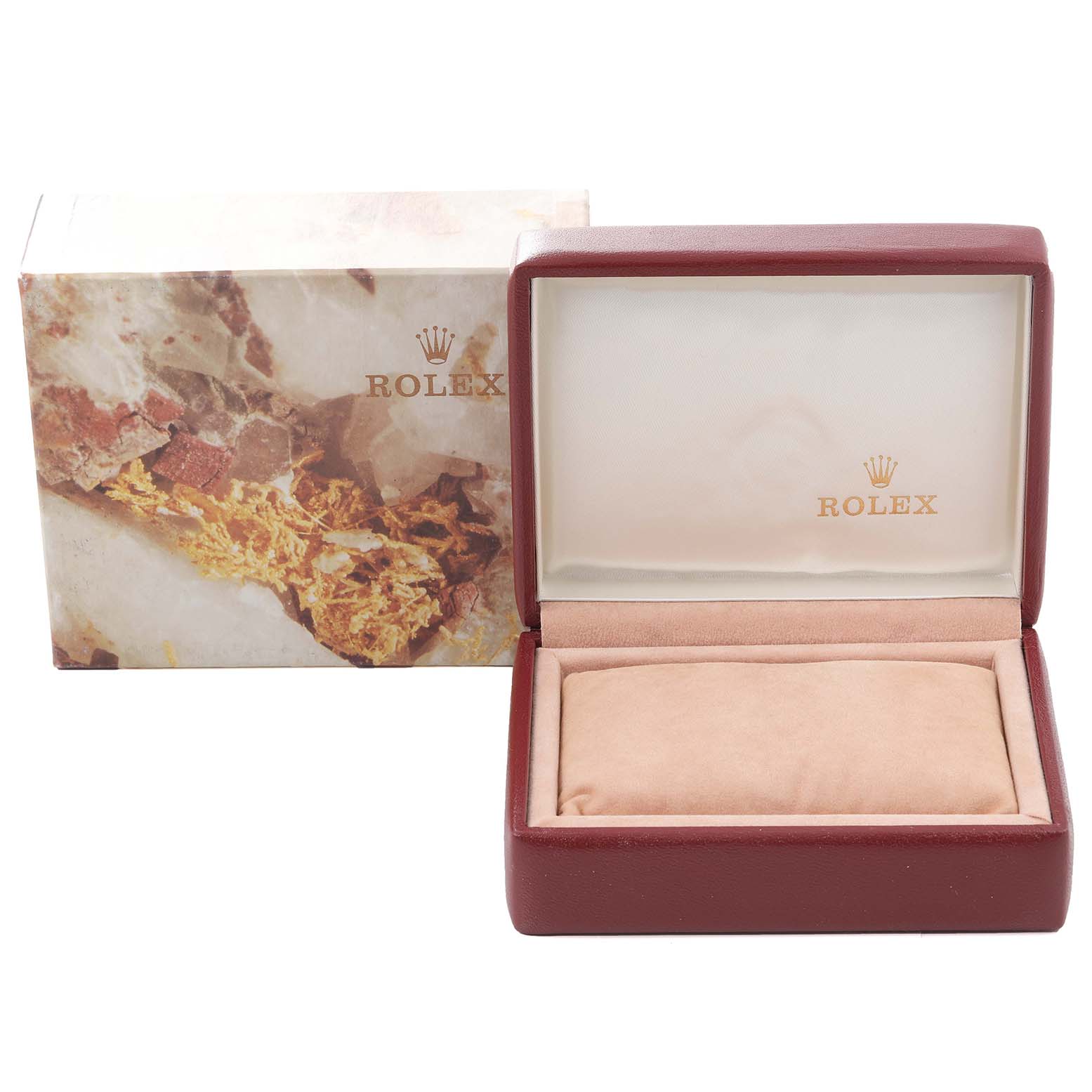 The image shows the packaging of a Rolex Oyster Perpetual 67193 Women's Steel and Gold (two tone) White Dial 67193 Women's Steel and Gold (two tone) White Dial, displaying the box and cushion from an above angle.