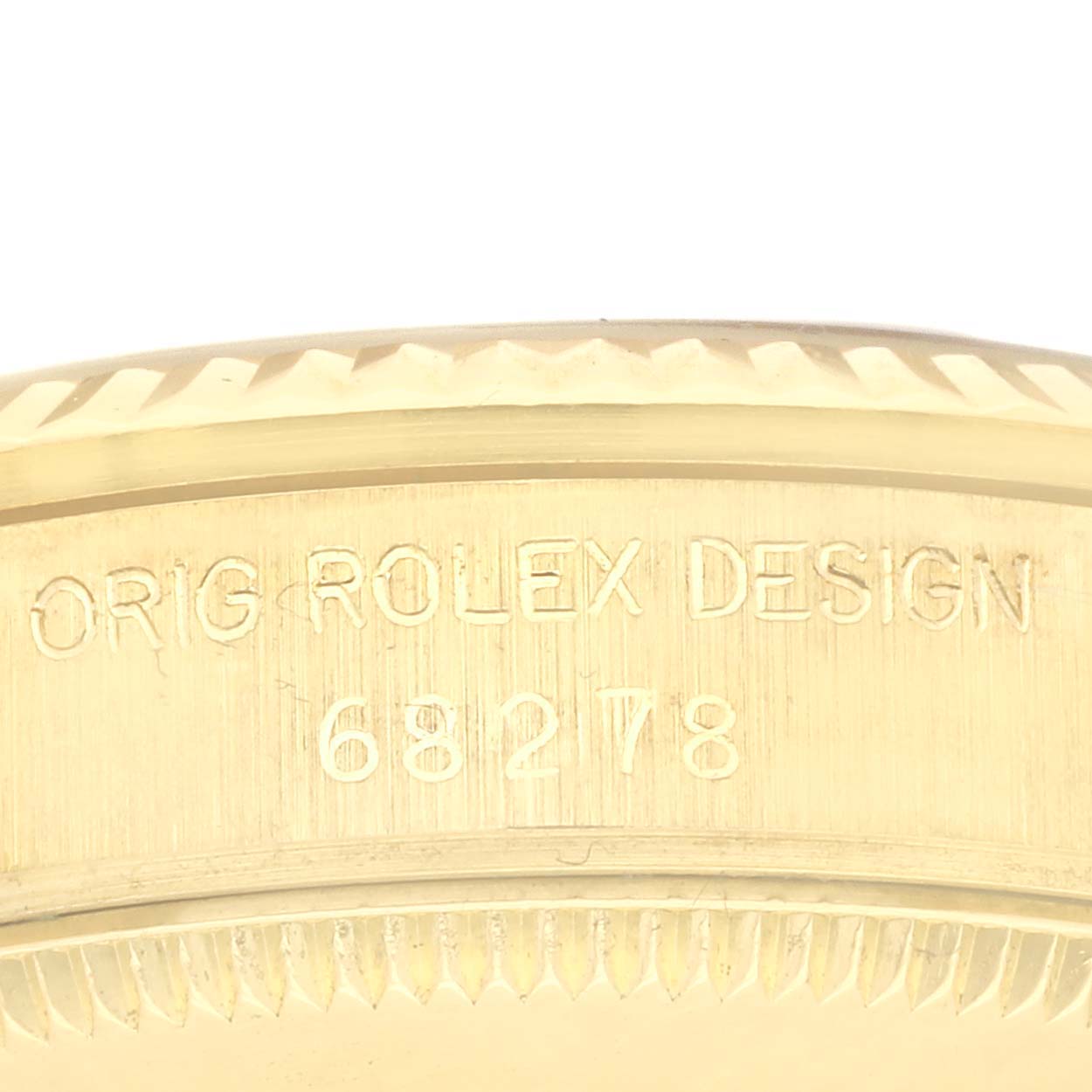 The image shows a close-up of the case back engraving of a Rolex President 68278 Women's Yellow Gold Champagne Dial 68278 Women's Yellow Gold Champagne Dial watch.