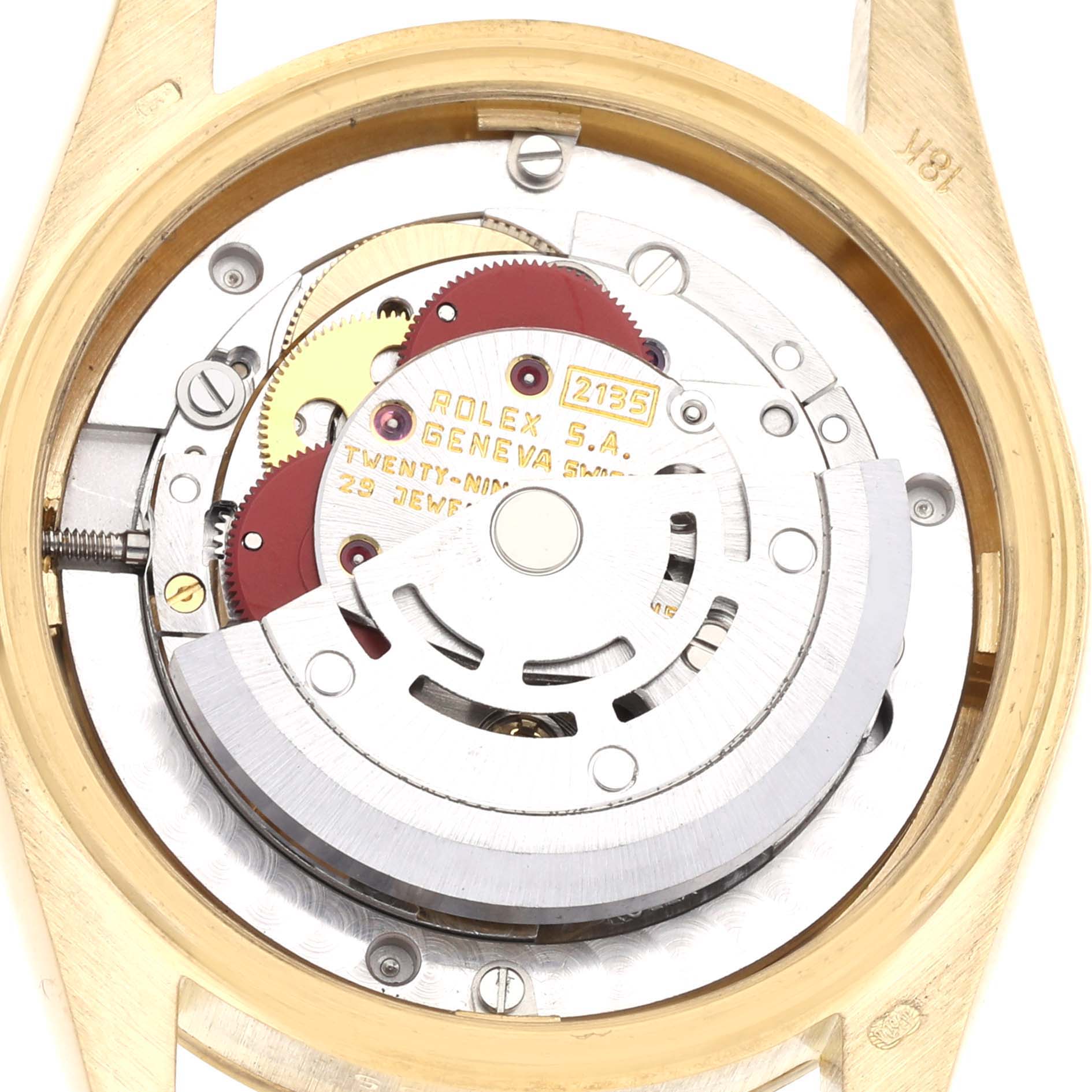 The image shows the inner mechanical movement of a Rolex President 68278 Women's Yellow Gold Champagne Dial 68278 Women's Yellow Gold Champagne Dial watch from the back, highlighting gears and components.