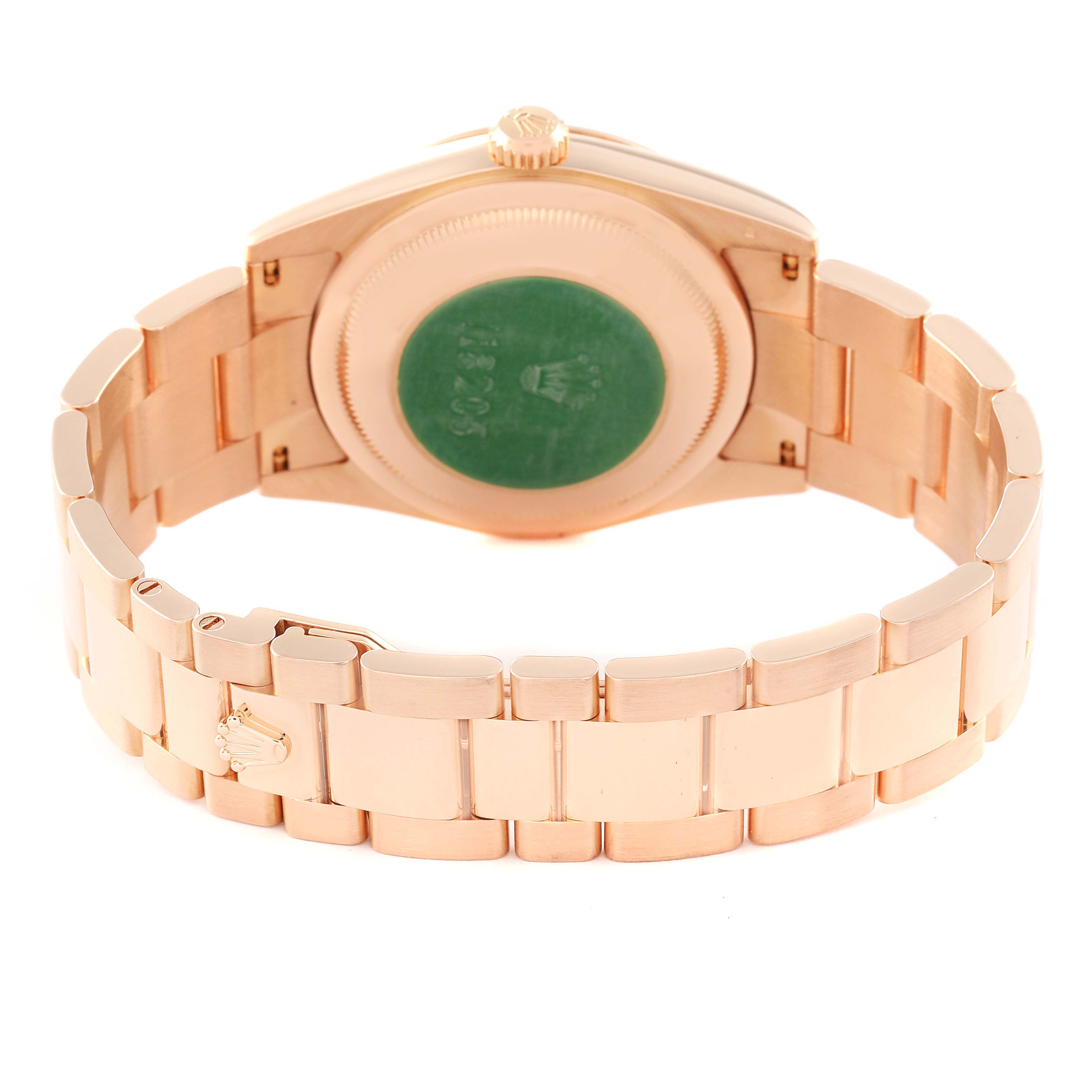 The image shows the back and bracelet of a Rolex President 118205 Men
s Rose Gold Black Dial 118205 Men
s Rose Gold Black Dial model watch from a rear angle.