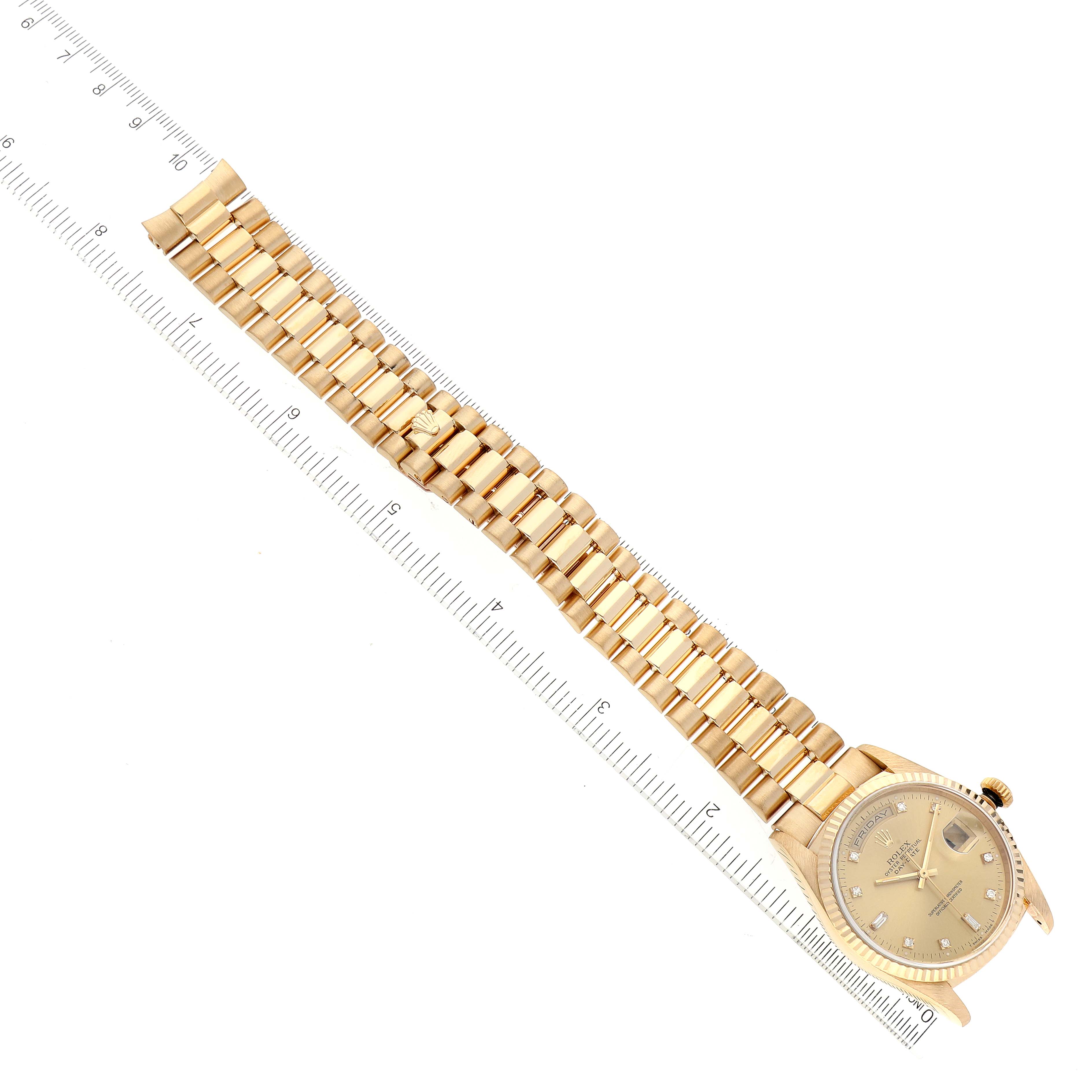 The image depicts a Rolex President 18238 Men's Yellow Gold Champagne Dial 18238 Men's Yellow Gold Champagne Dial model watch, shown from a top-down angle, highlighting the dial and full bracelet against a measuring scale.