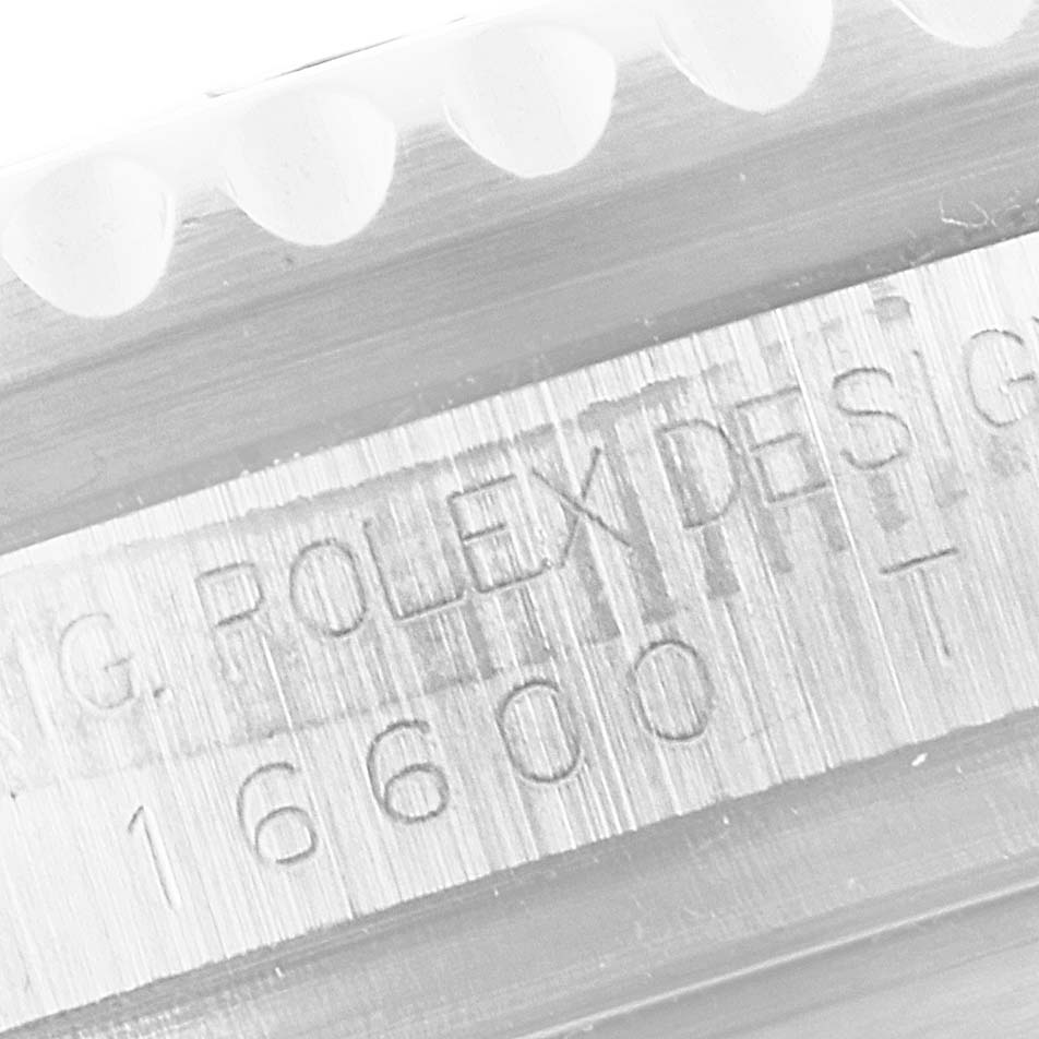 This image shows an engraved section of the Rolex Sea-Dweller 16600 Men
s Stainless Steel Black Dial 16600 Men
s Stainless Steel Black Dial watch case, specifically highlighting the model number 16600.