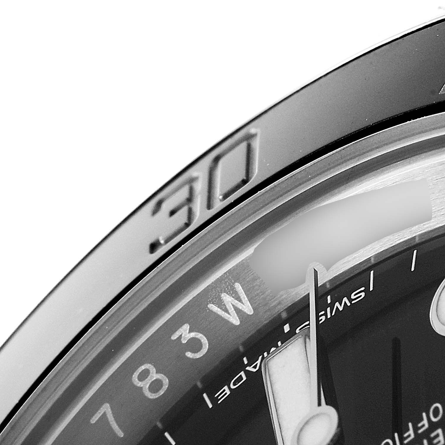 The image shows a close-up angle of the Rolex Submariner 116610 Men
s Stainless Steel Black Dial 116610 Men
s Stainless Steel Black Dial
s bezel and part of the dial with the second hand.