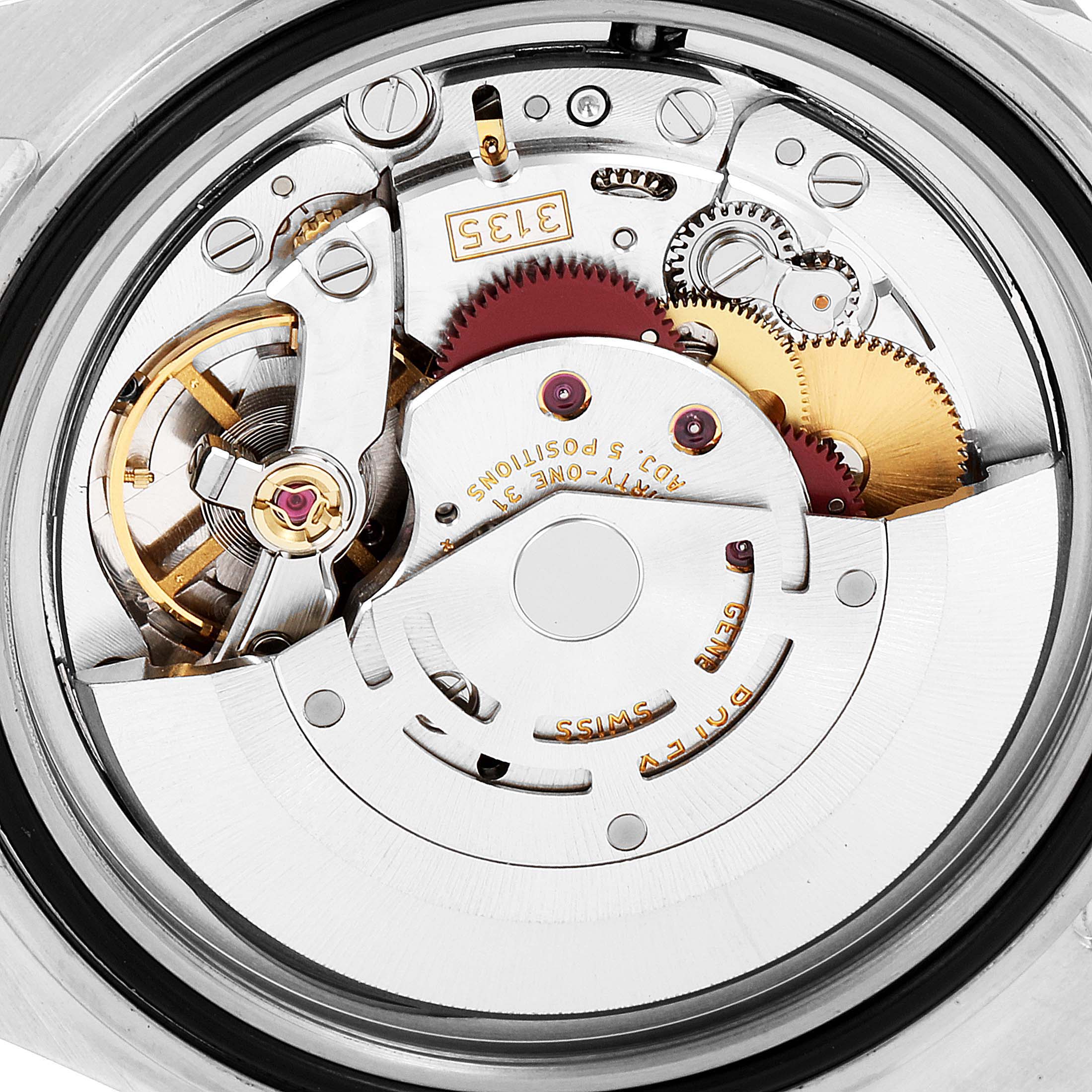 This image shows a close-up view of the inner mechanical workings of a Rolex Submariner 16610 Men
s Stainless Steel Black Dial 16610 Men
s Stainless Steel Black Dial watch.