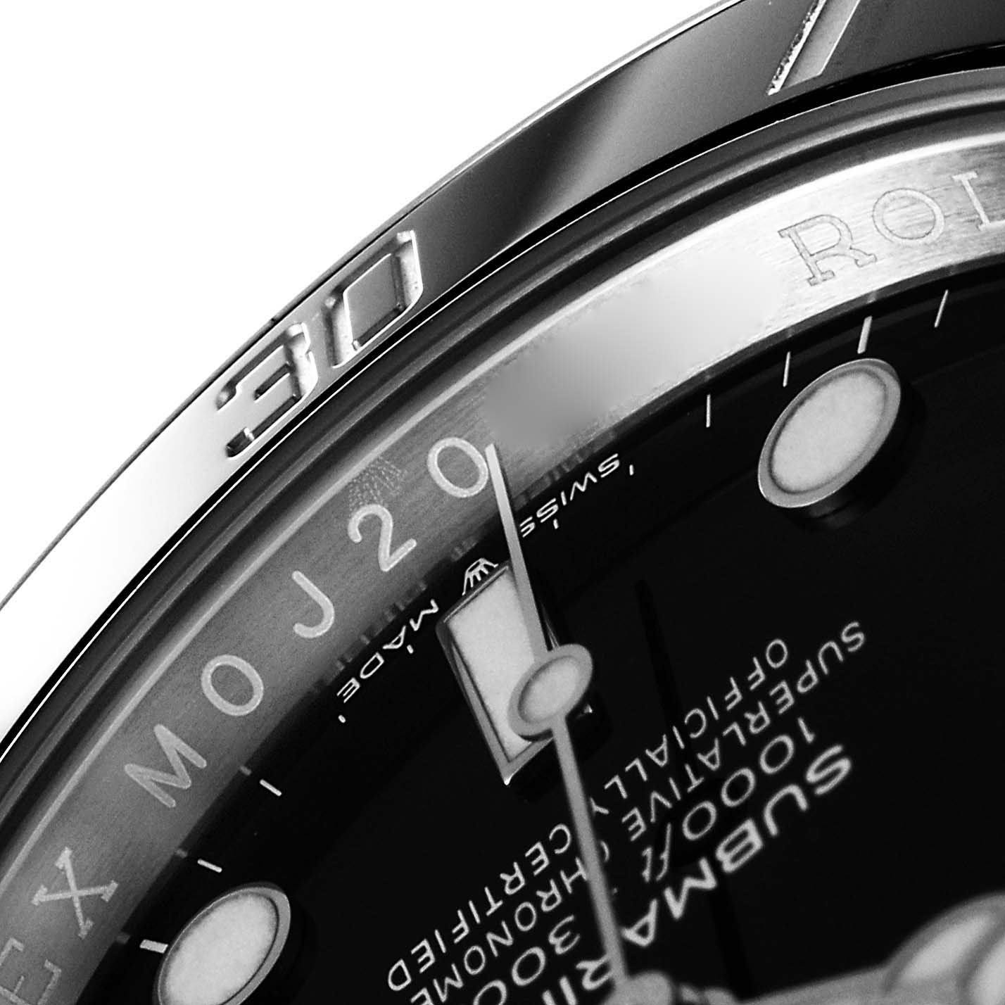 This close-up angle of the Rolex Submariner 126610 Men
s Stainless Steel Black Dial 126610 Men
s Stainless Steel Black Dial shows part of the bezel, hour markers, and the inscription on the dial.