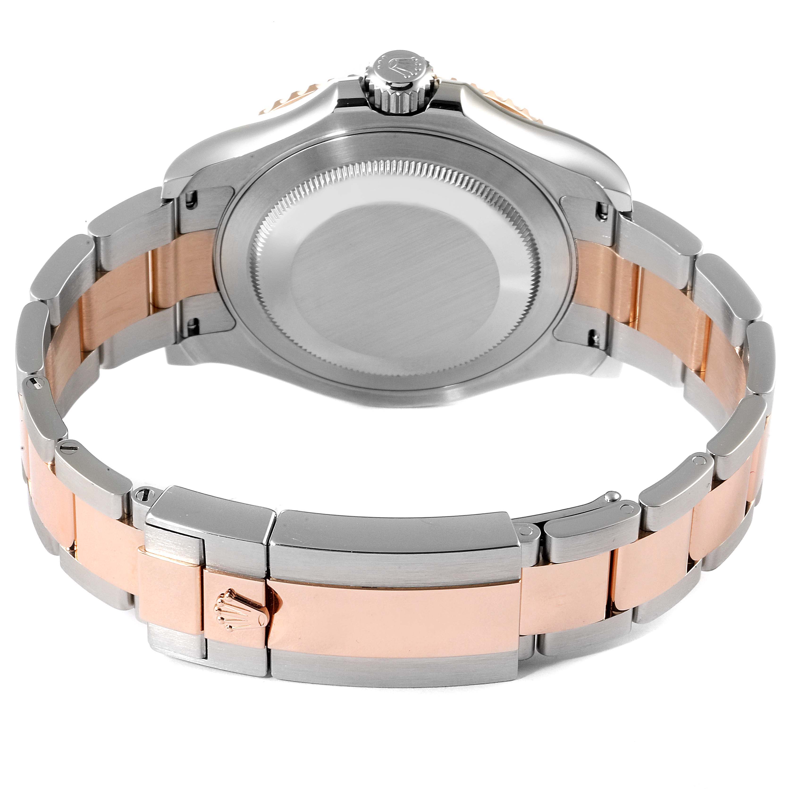 The image shows the back view of a Rolex Yacht-Master 116621 Men's Steel and Gold (two tone) Brown Dial 116621 Men's Steel and Gold (two tone) Brown Dial watch with its case and two-tone bracelet visible.