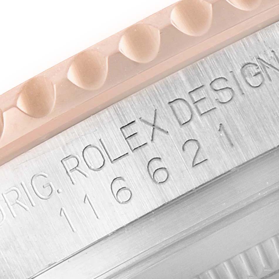 This close-up image shows the engraved side of the Rolex Yacht-Master 116621 Men's Steel and Gold (two tone) Brown Dial 116621 Men's Steel and Gold (two tone) Brown Dial watch, including part of the bezel and model number.