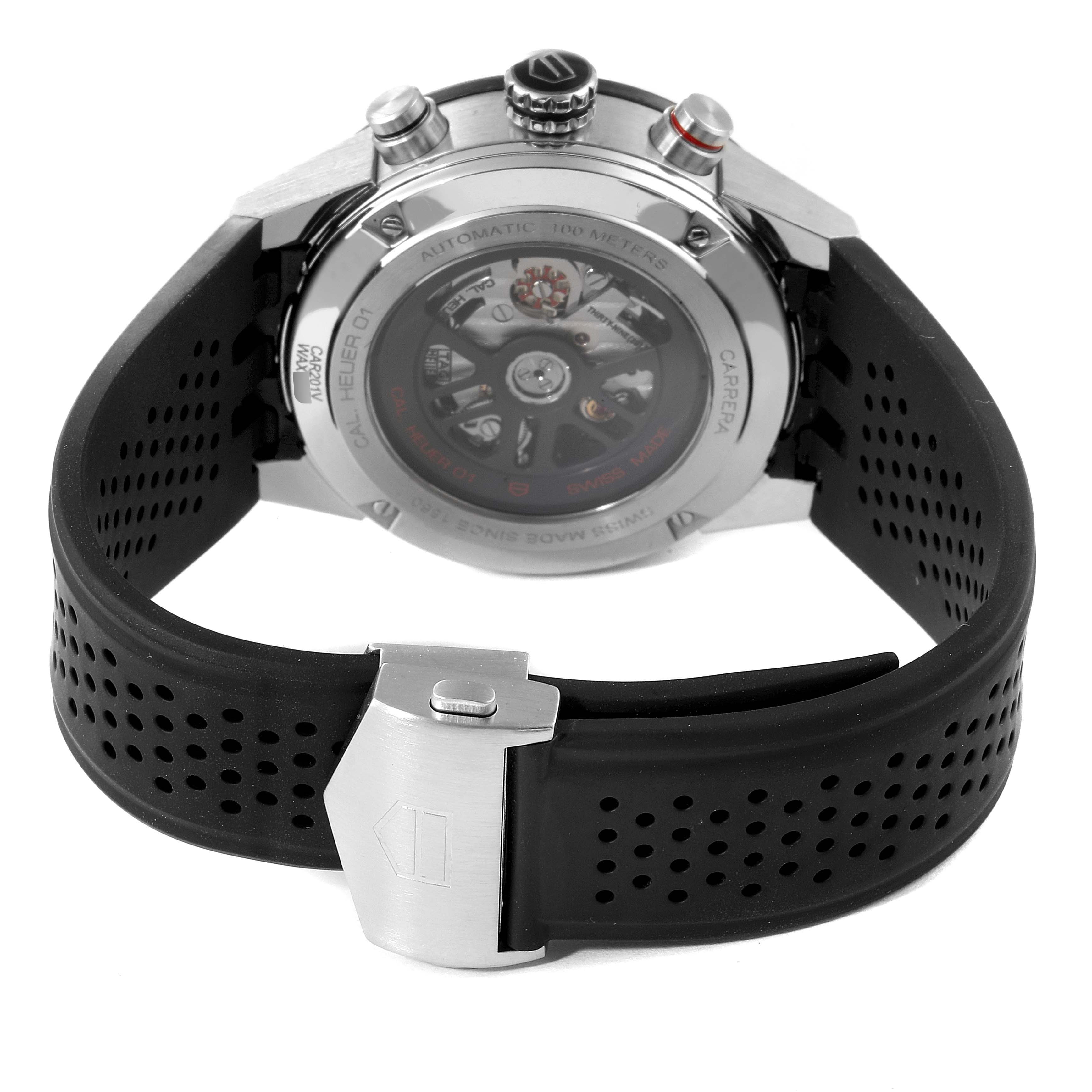 This image shows the back view of a Tag Heuer Carrera CAR201V.BA0714 Men
s Stainless Steel Black Dial CAR201V.BA0714 Men
s Stainless Steel Black Dial watch, highlighting the automatic movement and rubber strap with a clasp.