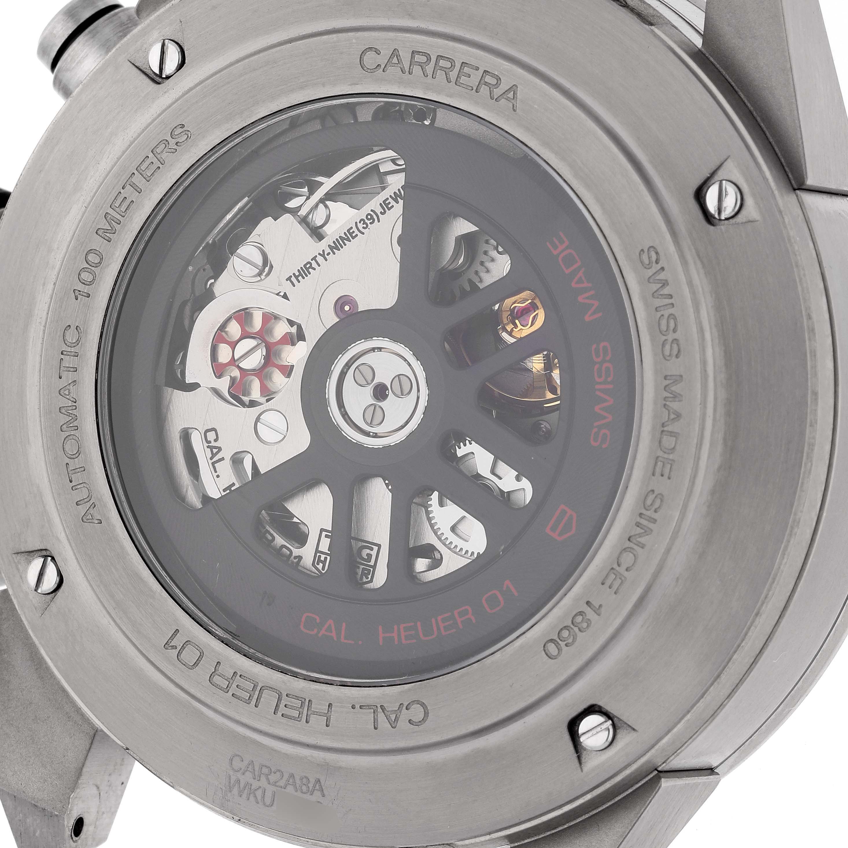 This image shows the back view of a Tag Heuer Carrera CAR2A8A.BF0707 Men's Titanium Grey Dial CAR2A8A.BF0707 Men's Titanium Grey Dial watch, revealing its automatic movement and intricate inner mechanics.