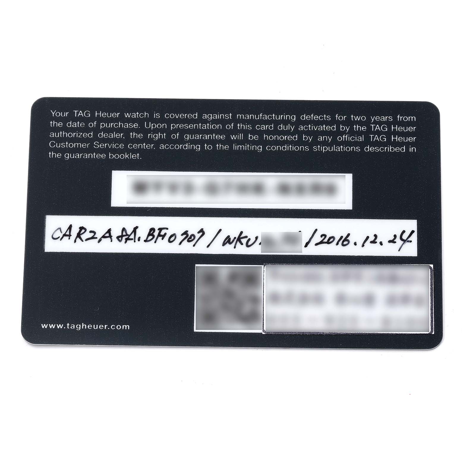 The image shows a warranty card for a Tag Heuer Carrera CAR2A8A.BF0707 Men's Titanium Grey Dial CAR2A8A.BF0707 Men's Titanium Grey Dial watch, displaying handwritten serial numbers and purchase details.