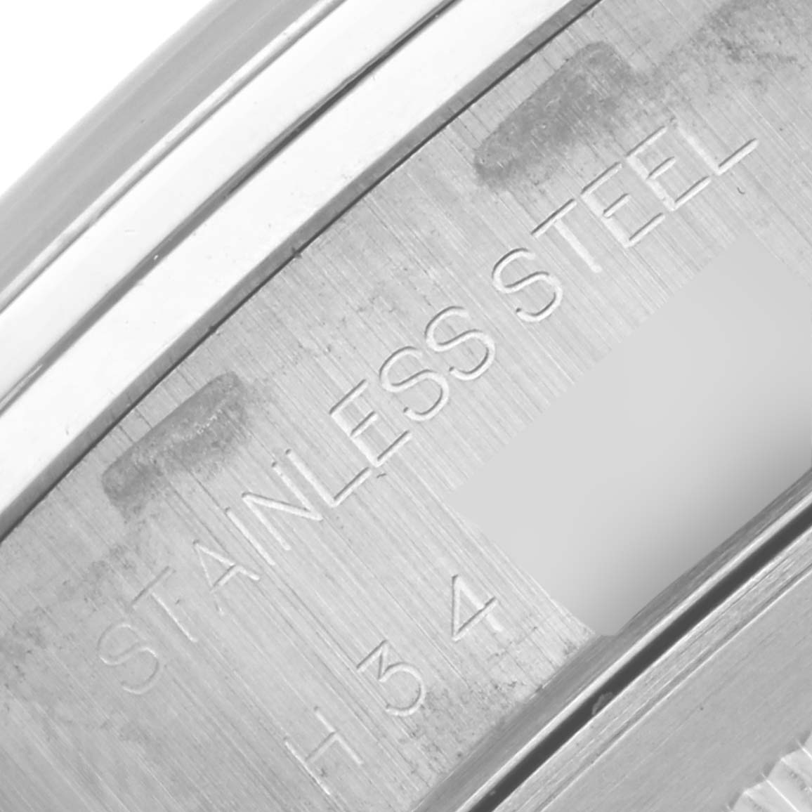 The image shows a close-up of the stainless steel case back of a Tudor Prince watch.