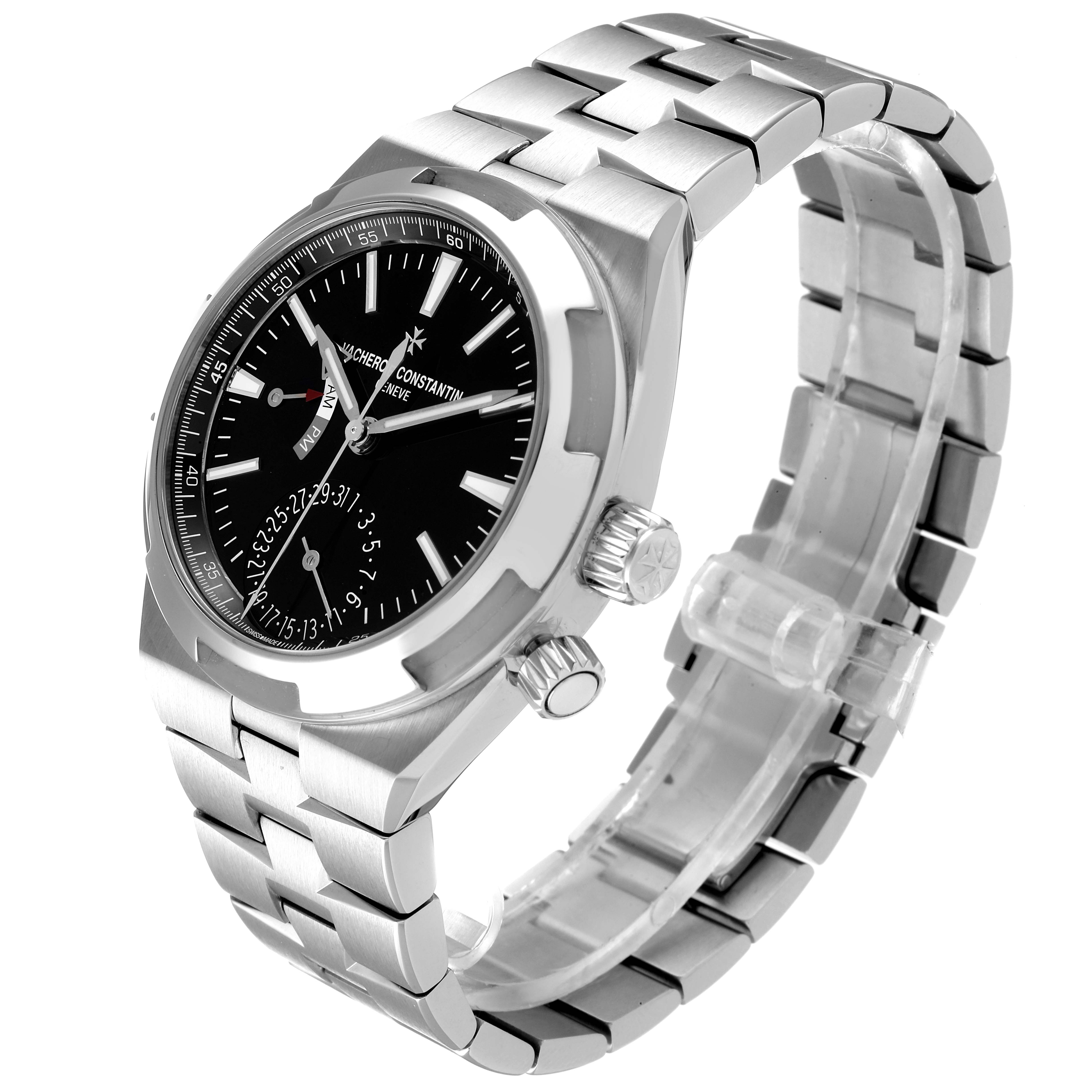 The image shows a Vacheron Constantin Overseas 7900V/110A Men
s Stainless Steel Black Dial 7900V/110A Men
s Stainless Steel Black Dial watch at a three-quarter angle, displaying its face, crown, and metal bracelet.