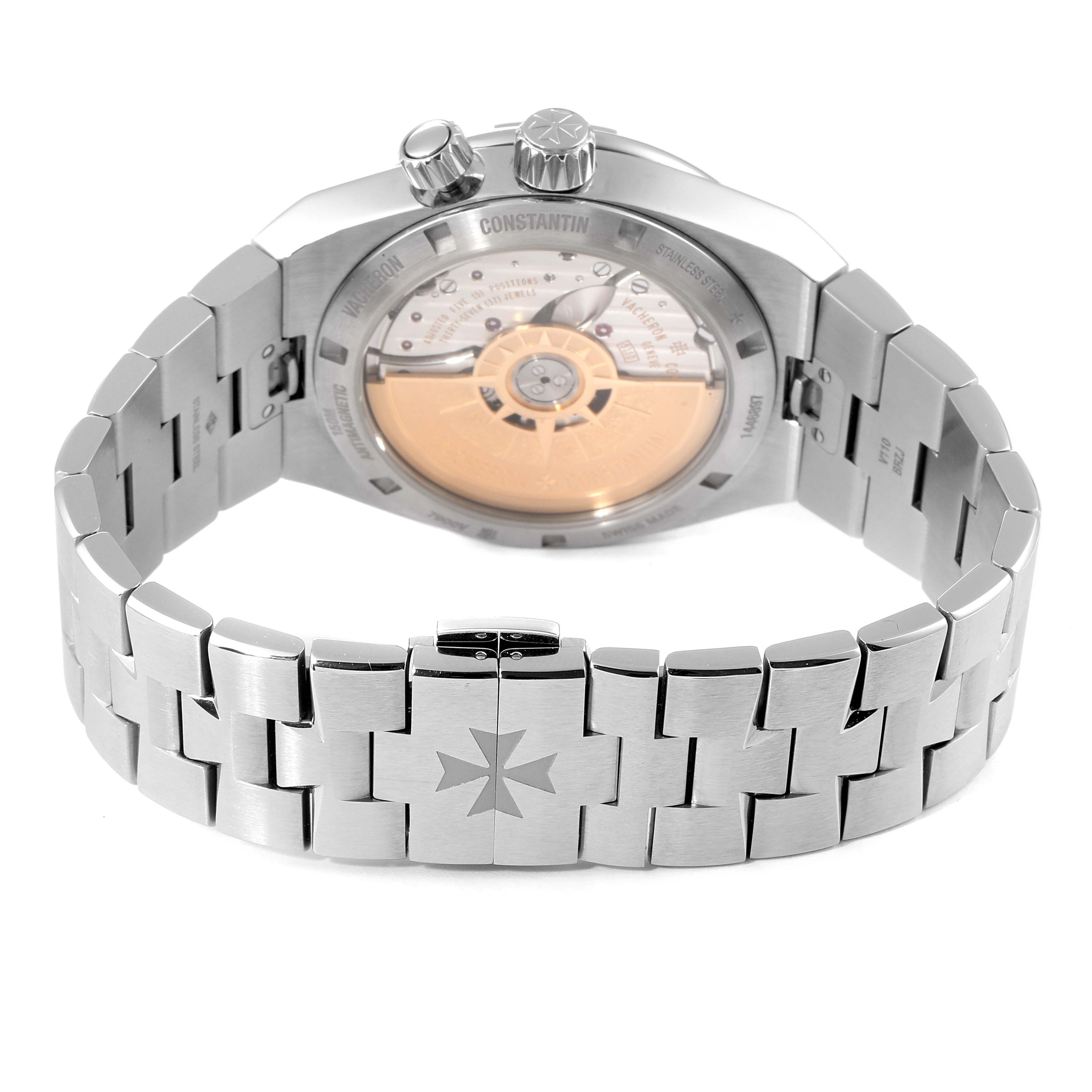 The image shows the back and the bracelet of the Vacheron Constantin Overseas 7900V/110A Men
s Stainless Steel Black Dial 7900V/110A Men
s Stainless Steel Black Dial watch at a slight angle, revealing its mechanical movement.