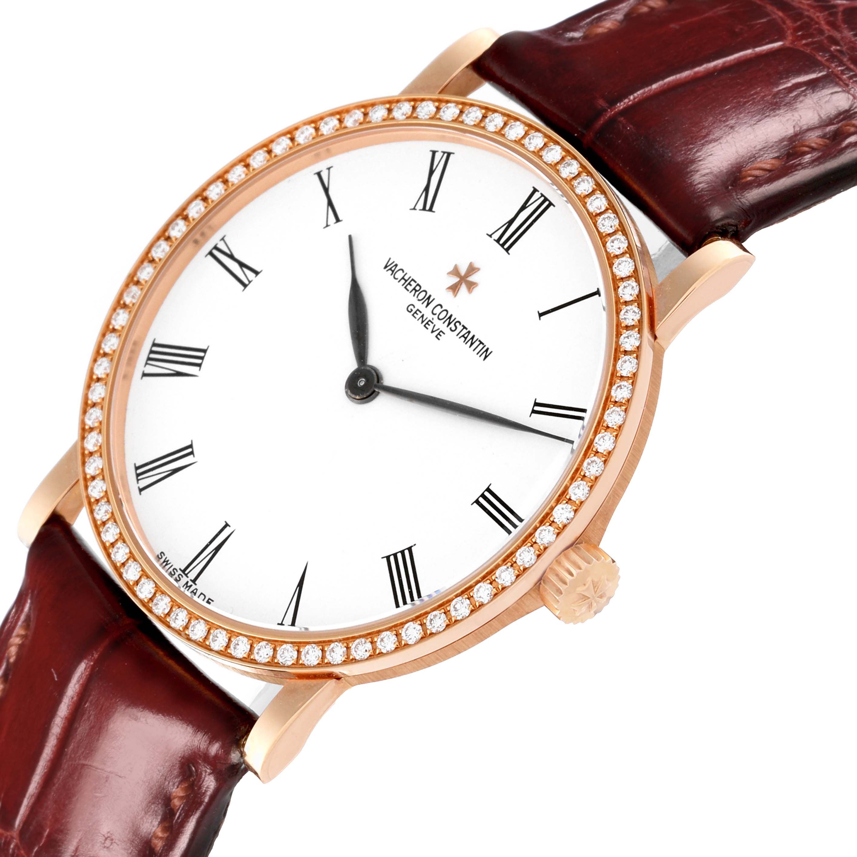 The Vacheron Constantin Traditionnelle 33593/3 Women's Rose Gold White Dial 33593/3 Women's Rose Gold White Dial watch is shown from a slight angle, featuring the face, bezel with diamonds, leather strap, and crown.