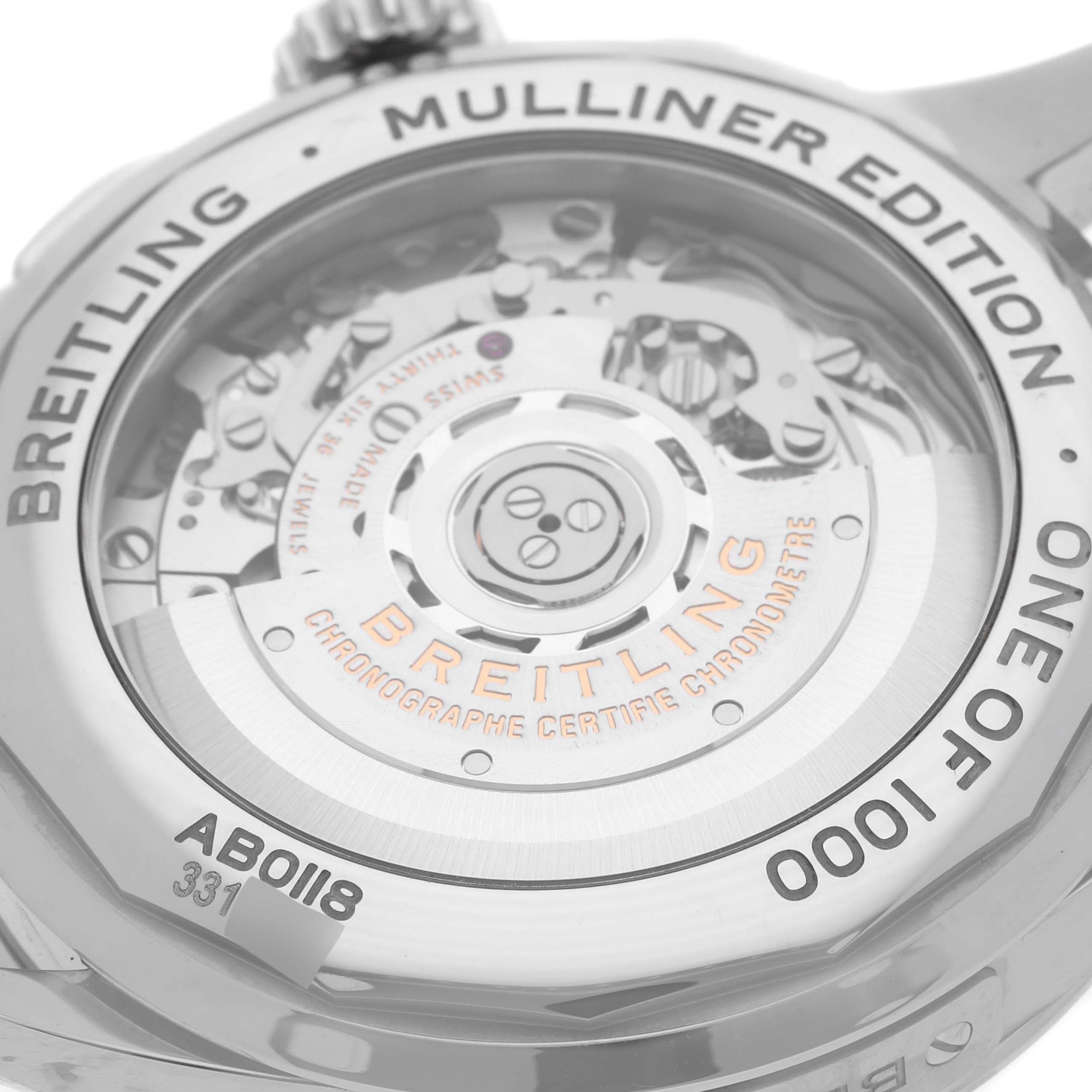 The Breitling Premier AB0118 Men's Stainless Steel Silver Dial AB0118 Men's Stainless Steel Silver Dial model is shown from the back, highlighting its intricate movement and "Mulliner Edition" engraving.
