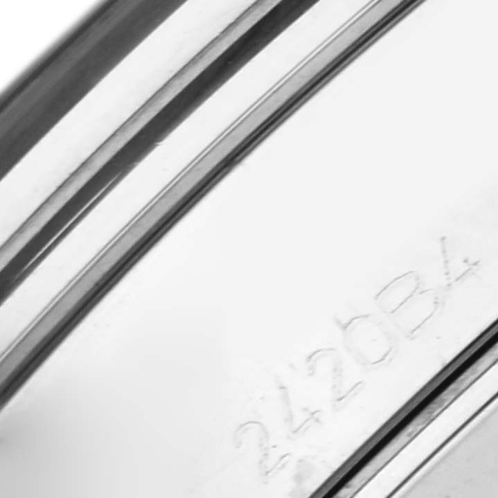 The image shows an angled close-up of the Breitling Premier AB0118 Men's Stainless Steel Silver Dial AB0118 Men's Stainless Steel Silver Dial watch’s engraved side.