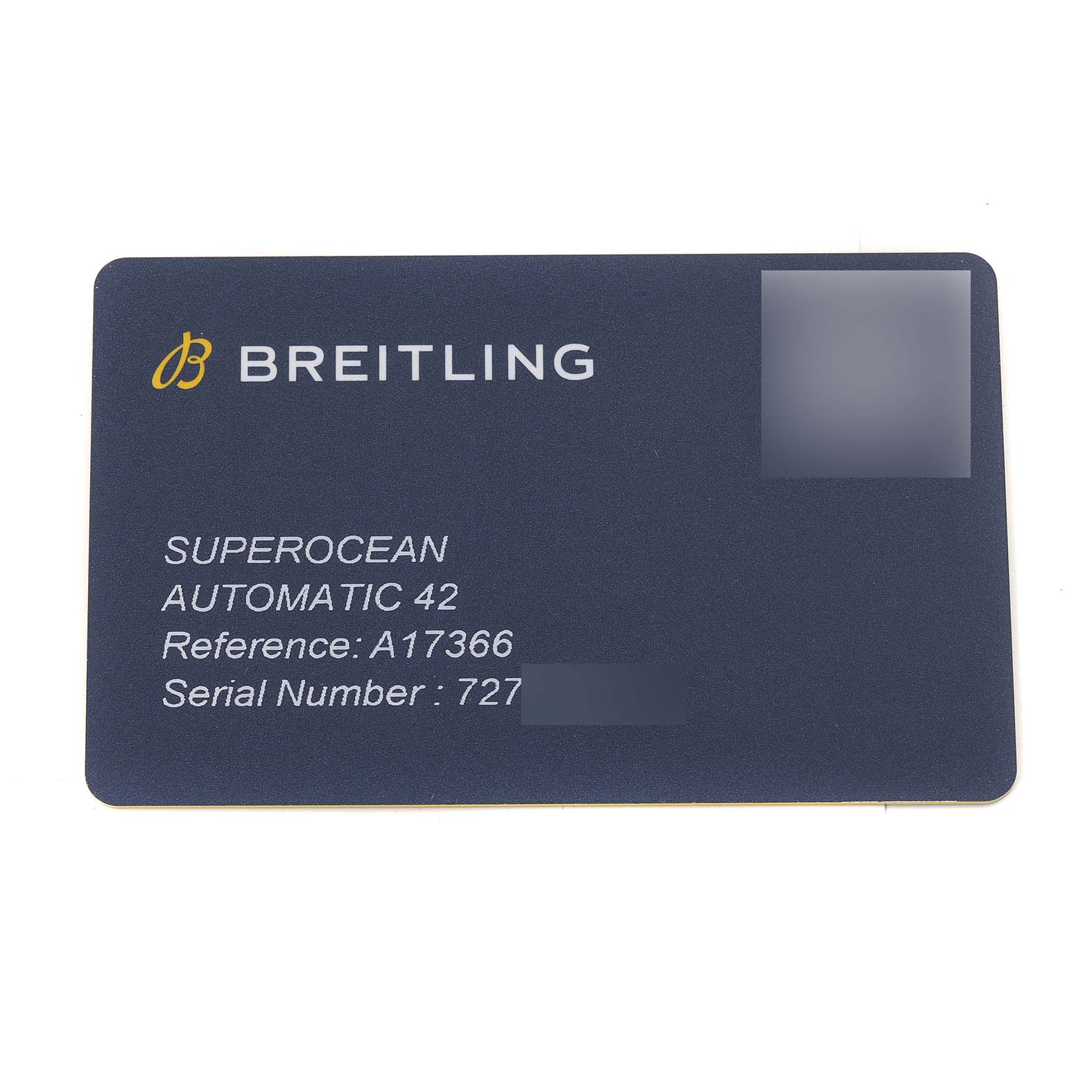 The image shows a Breitling Superocean A17366 Men's Stainless Steel Black Dial A17366 Men's Stainless Steel Black Dial Automatic 42 warranty card displaying the brand, model, reference number, and partially obscured serial number.