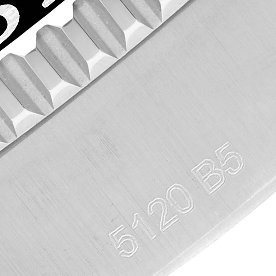 This close-up image shows part of the bezel and engraved details on the Breitling Superocean A17366 Men's Stainless Steel Black Dial A17366 Men's Stainless Steel Black Dial watch.