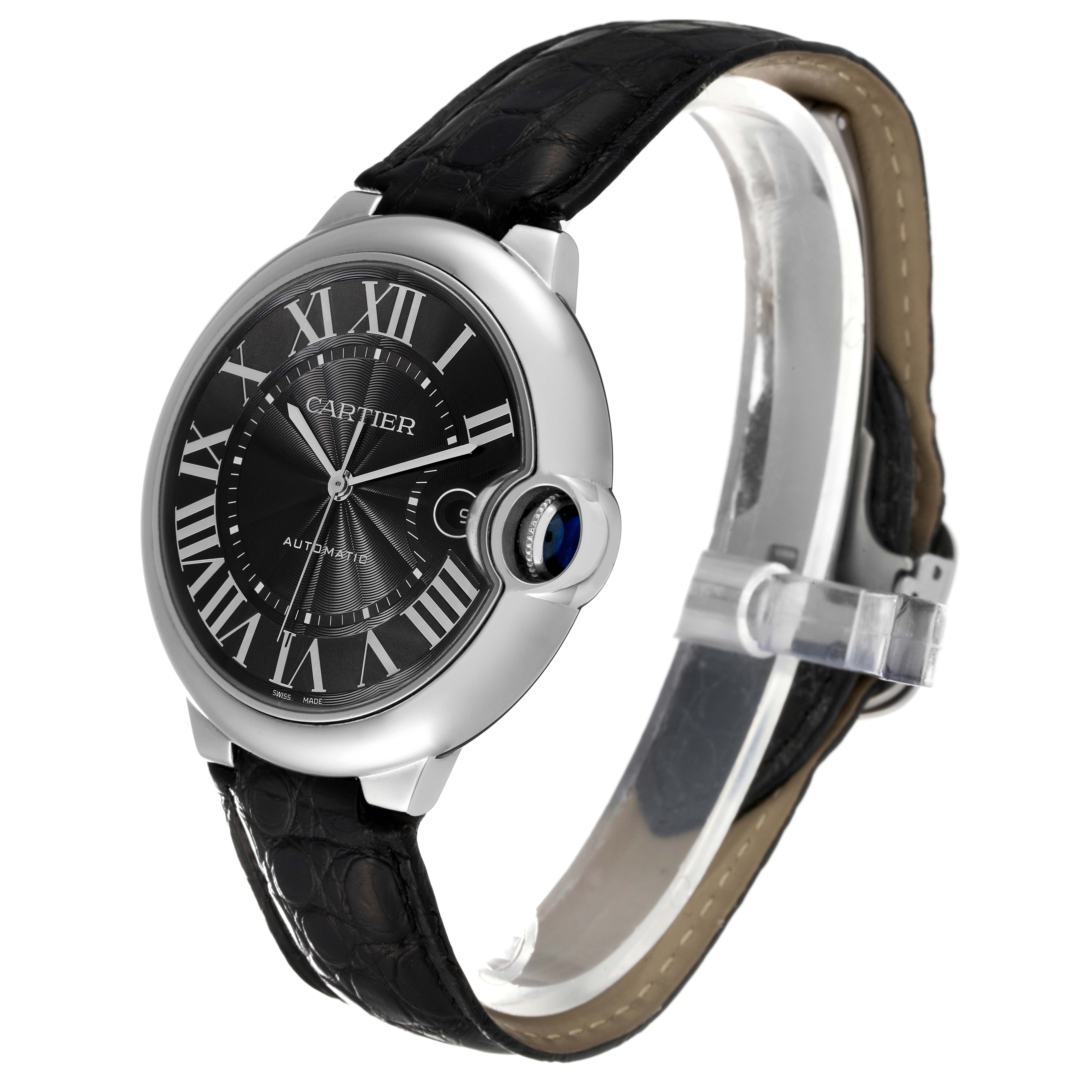 The image shows a Ballon Bleu by Cartier watch at a slight angled side view, displaying its face, case, and black leather strap.