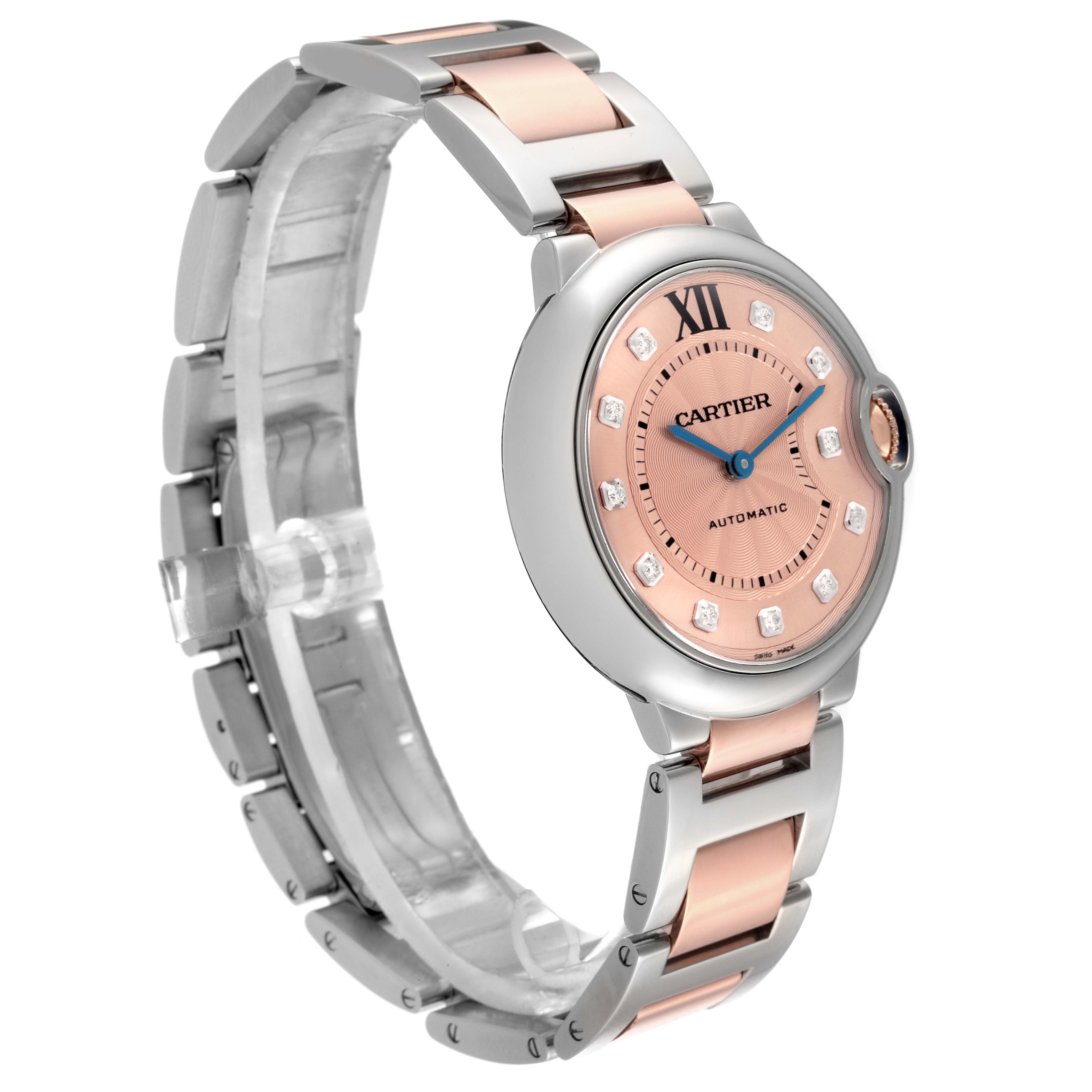 The Cartier Ballon Bleu WE902054 Women's Steel and Gold (two tone) Pink Dial WE902054 Women's Steel and Gold (two tone) Pink Dial watch is shown at a three-quarter angle, highlighting the dial and two-tone bracelet.