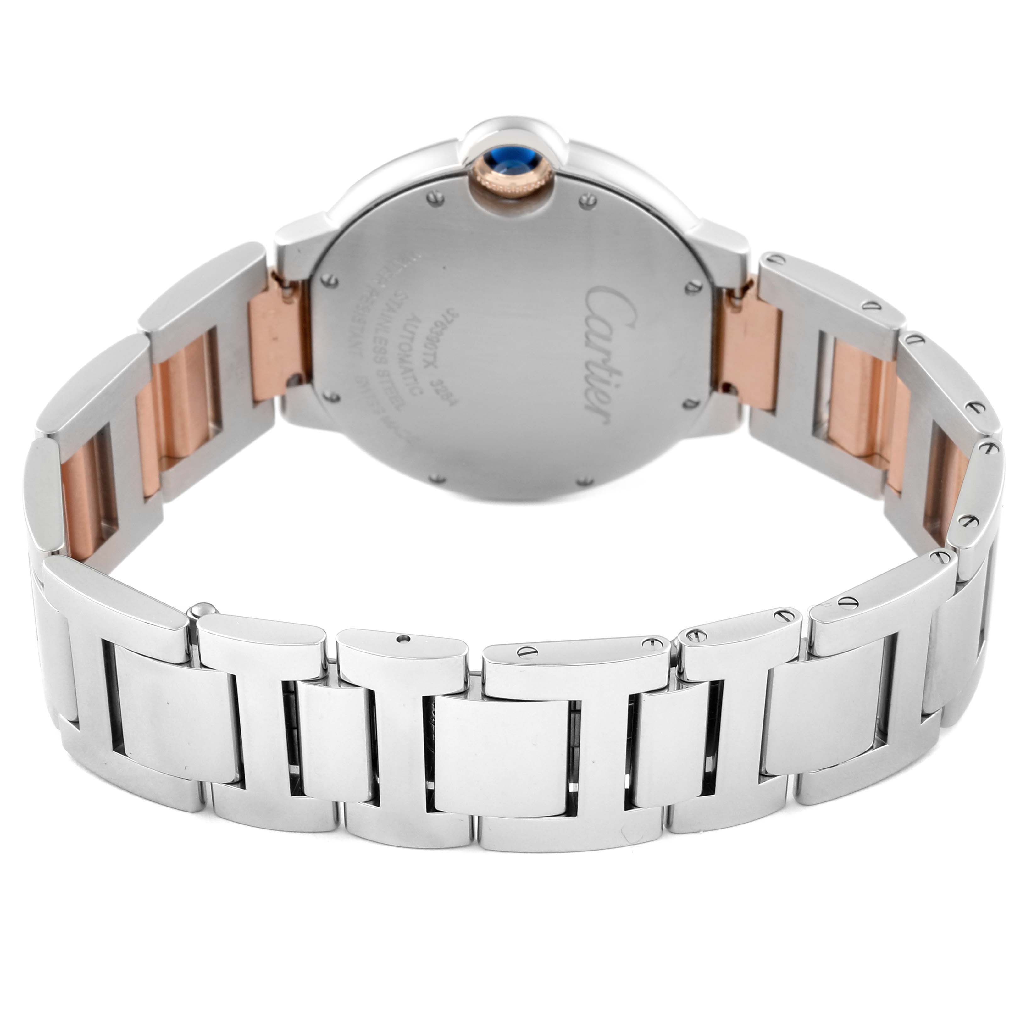 The image shows the back and bracelet of the Ballon Bleu by Cartier, highlighting the clasp and links.