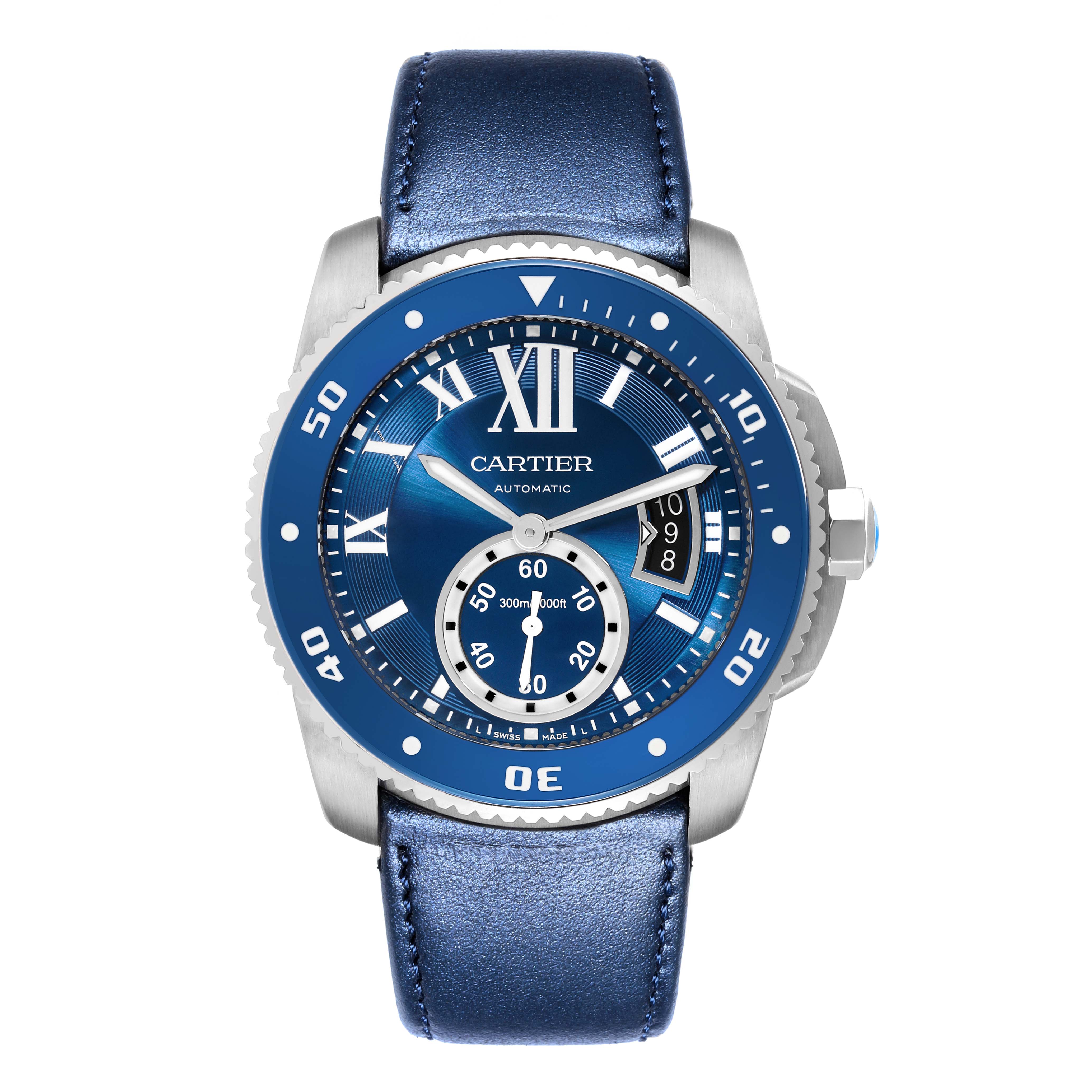 The Calibre de Cartier watch is shown from the front, highlighting the blue dial, bezel, and leather strap.
