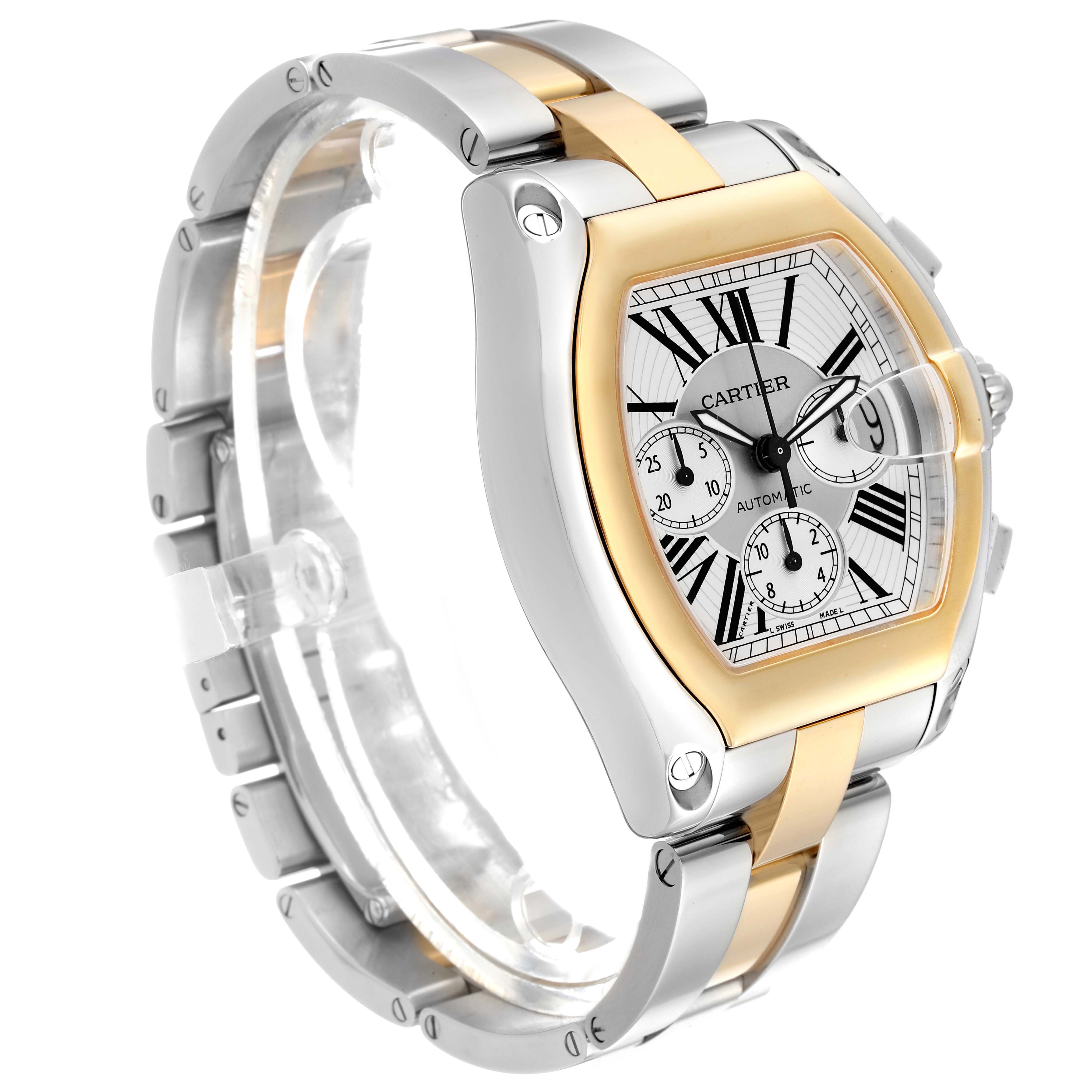 The Cartier Roadster W62027Z1 Men's Steel and Gold (two tone) Silver Dial watch is shown at an angle revealing the face, bezel, and bracelet with gold and silver tones.