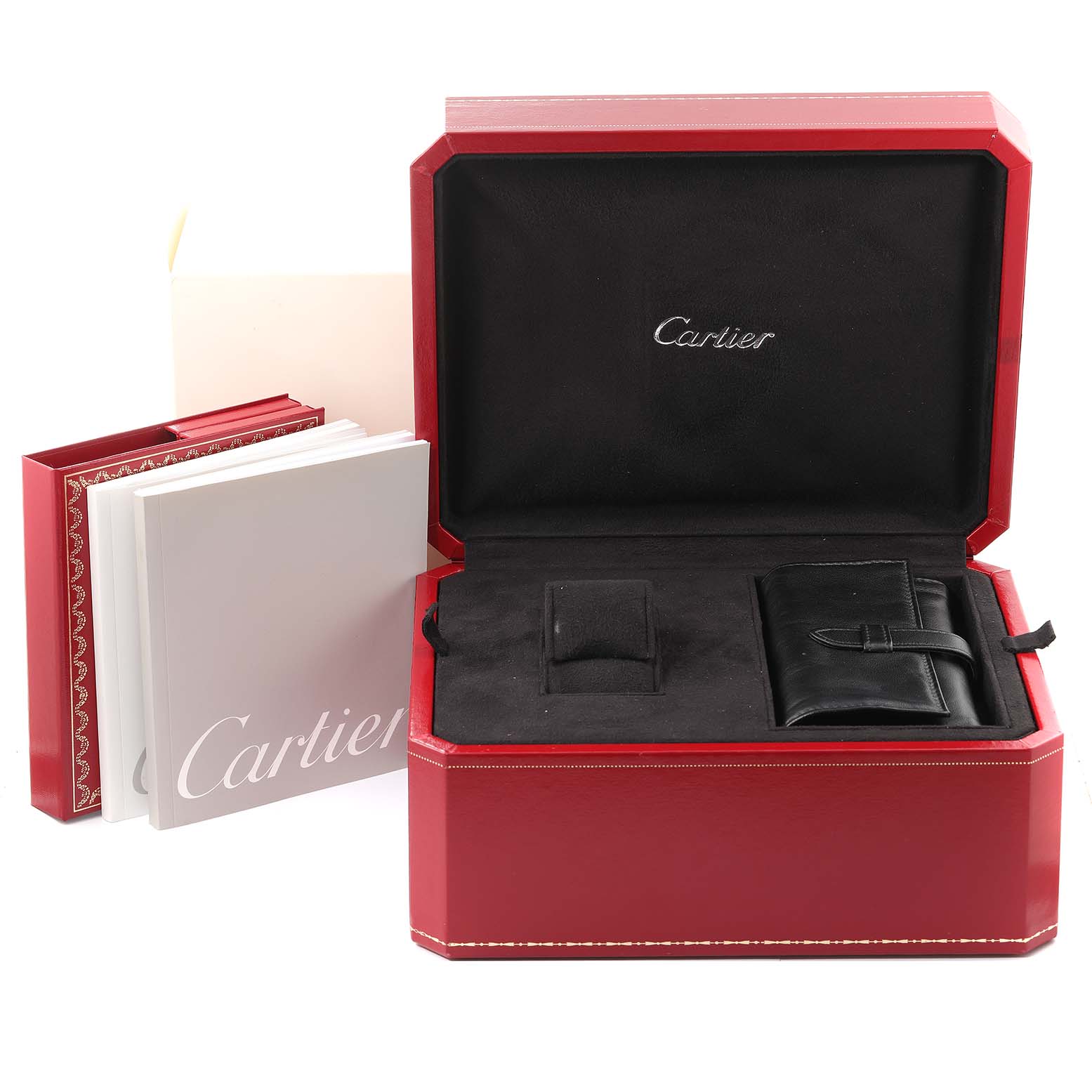 The image shows a red Cartier box for a Roadster model watch, alongside accompanying booklets and a black pouch.
