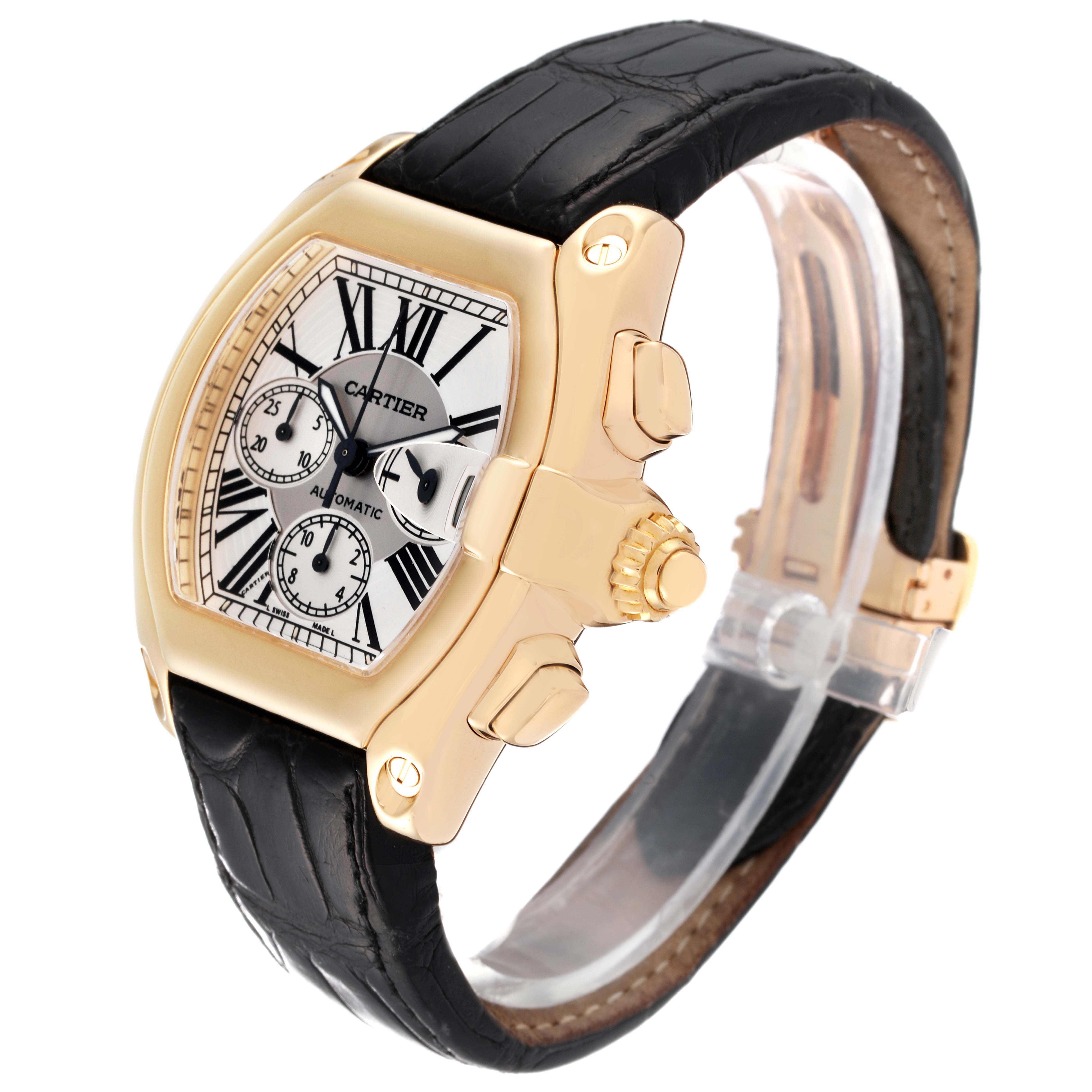 This image shows the Cartier Roadster W62021Y3 Men's Yellow Gold Silver Dial W62021Y3 Men's Yellow Gold Silver Dial watch at a three-quarter angle, highlighting its dial, case, crown, and leather strap.