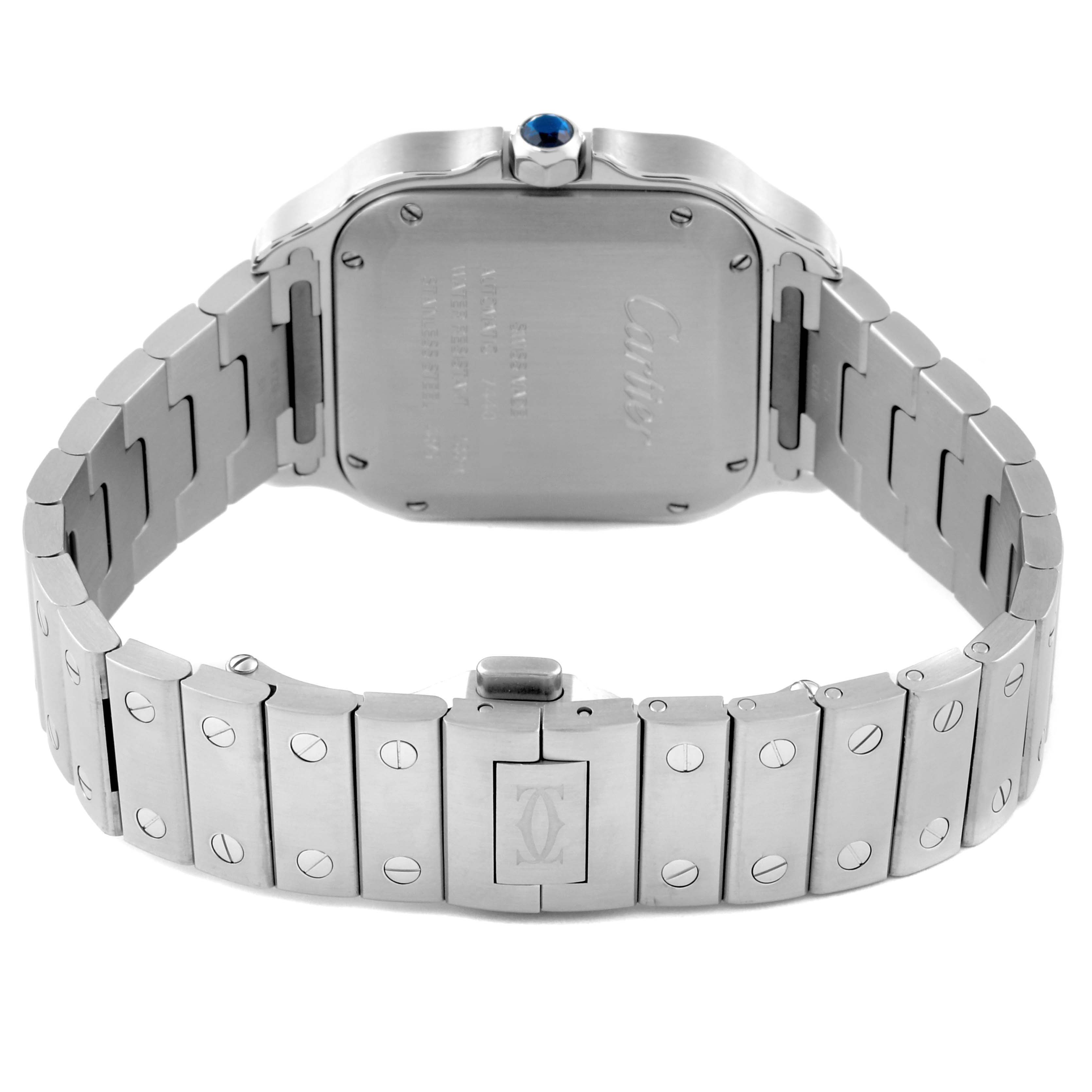 The image shows the back case, bracelet, and clasp of a Cartier Santos WSSA0010 Men's Stainless Steel Silver Dial WSSA0010 Men's Stainless Steel Silver Dial watch at an angled rear view.