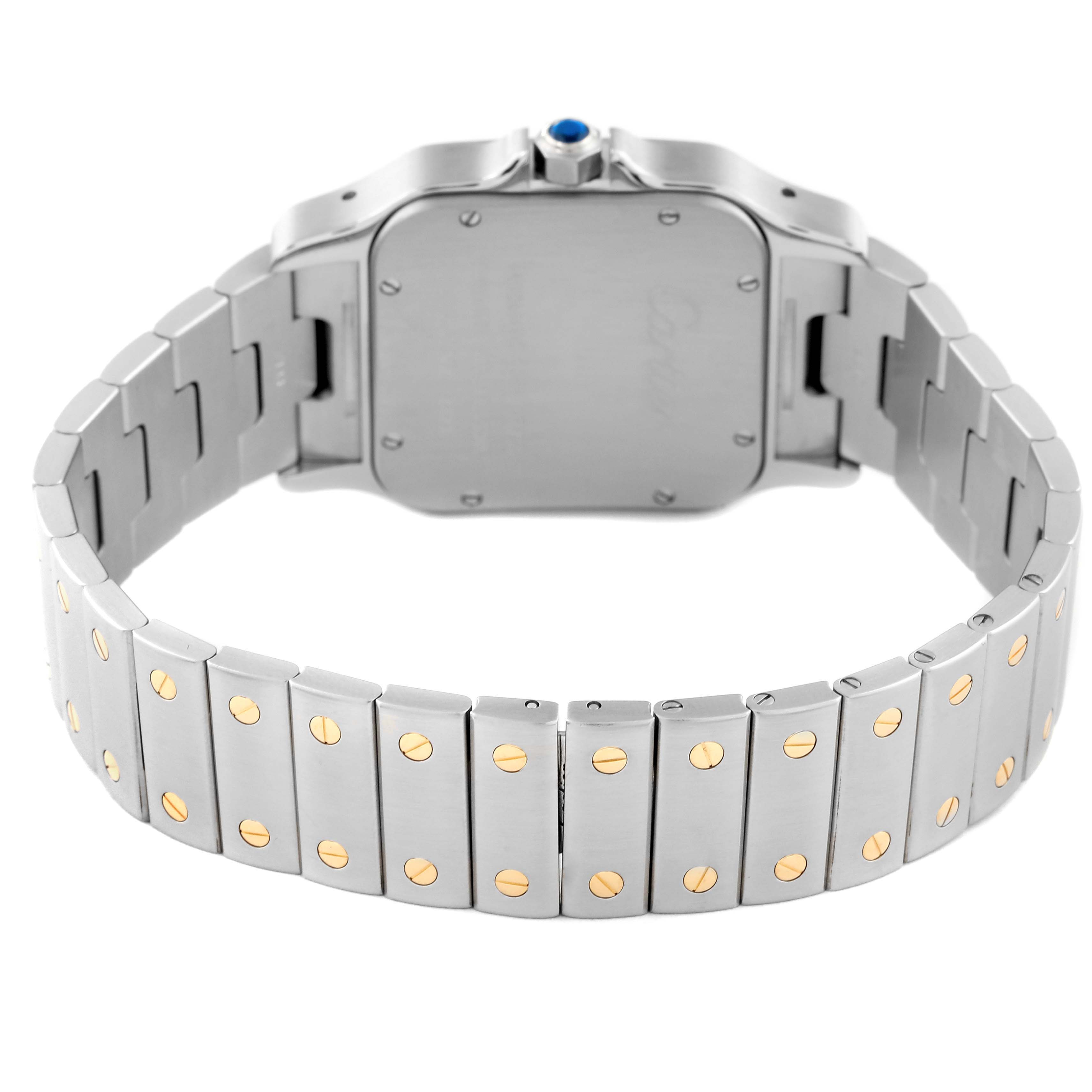 The image shows the back and bracelet of the Cartier Santos W20099C4 Men's Steel and Gold (two tone) Silver Dial W20099C4 Men's Steel and Gold (two tone) Silver Dial watch, featuring a two-tone design with visible screws.