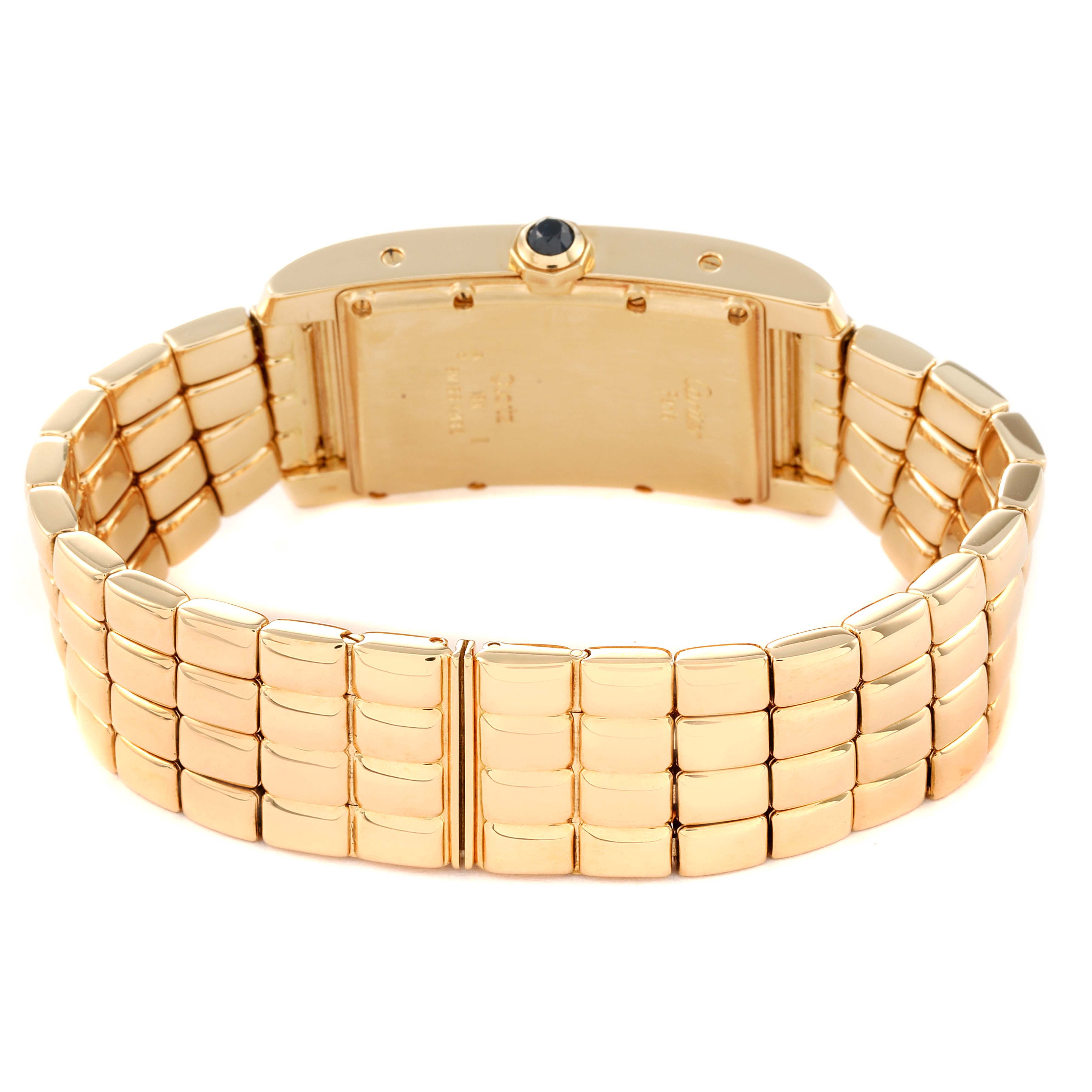 The image shows the back view of the Cartier Tank Americaine W26009C9 Women
s Yellow Gold Silver Dial W26009C9 Women
s Yellow Gold Silver Dial watch, highlighting its gold bracelet and case back.