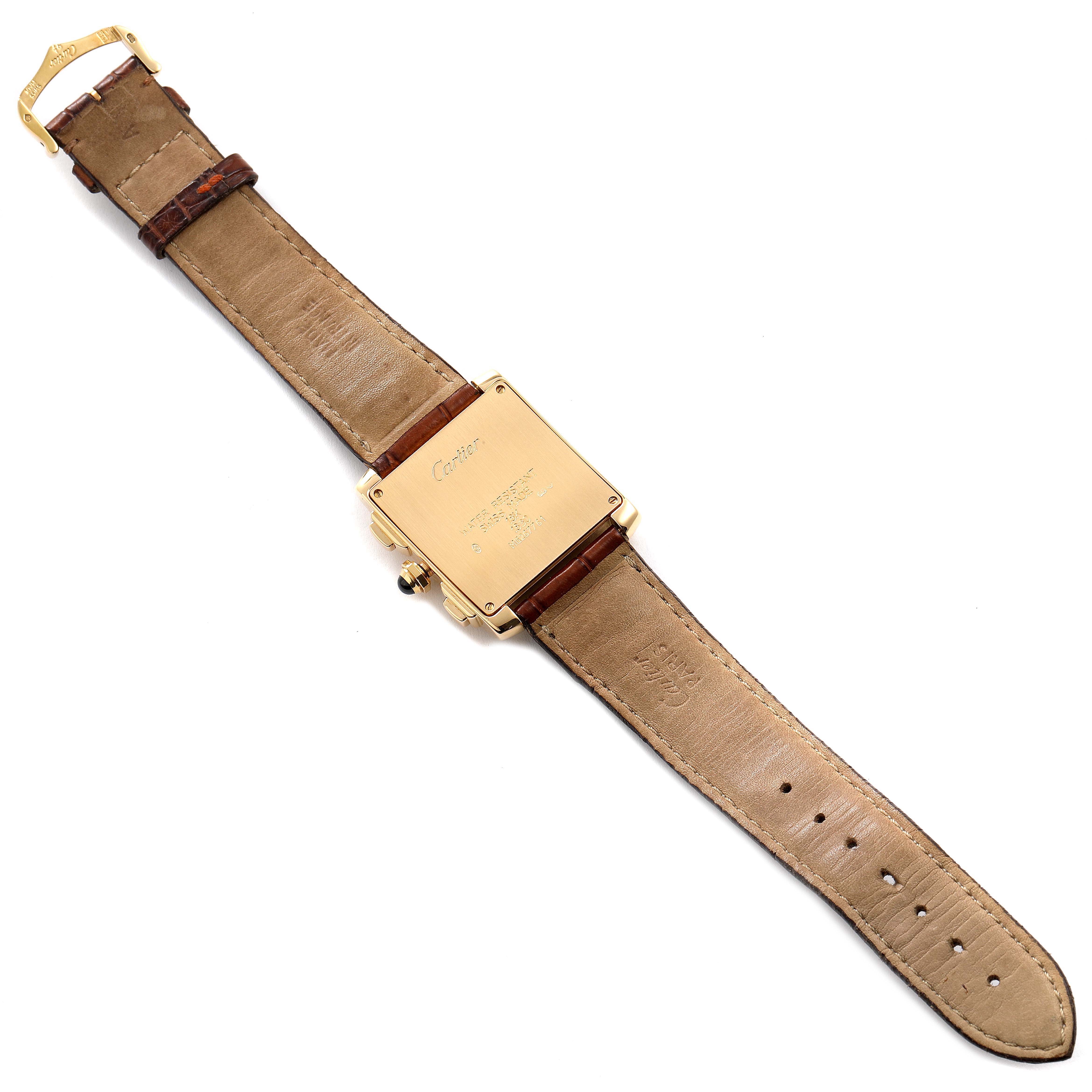 The image shows the back view of a Cartier Tank Française watch, highlighting the case back, leather strap, and buckle.