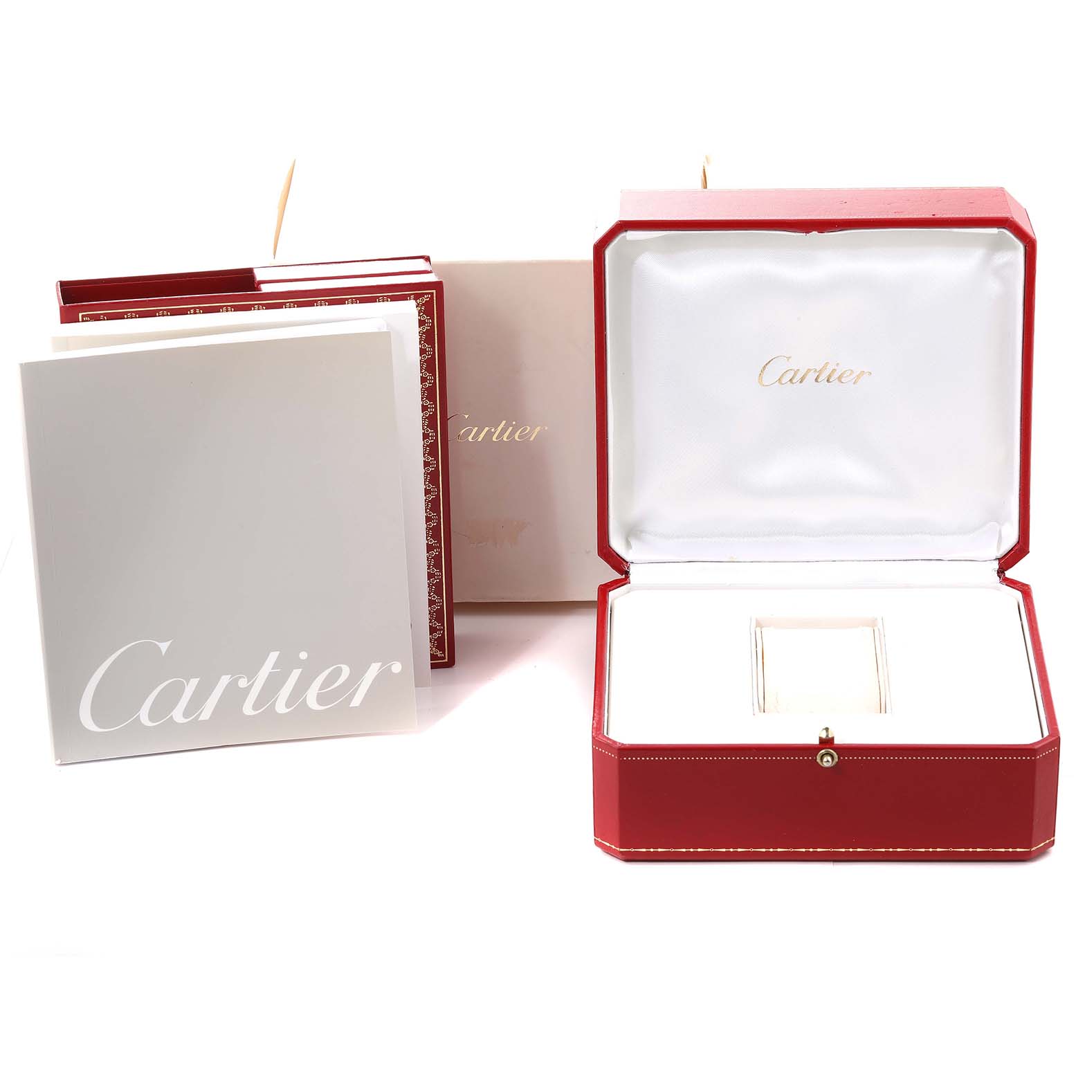 This image shows the packaging and manuals of the Cartier Tank Francaise WSTA0005 Women
s Stainless Steel Silver Dial WSTA0005 Women
s Stainless Steel Silver Dial model, including the watch box and papers.