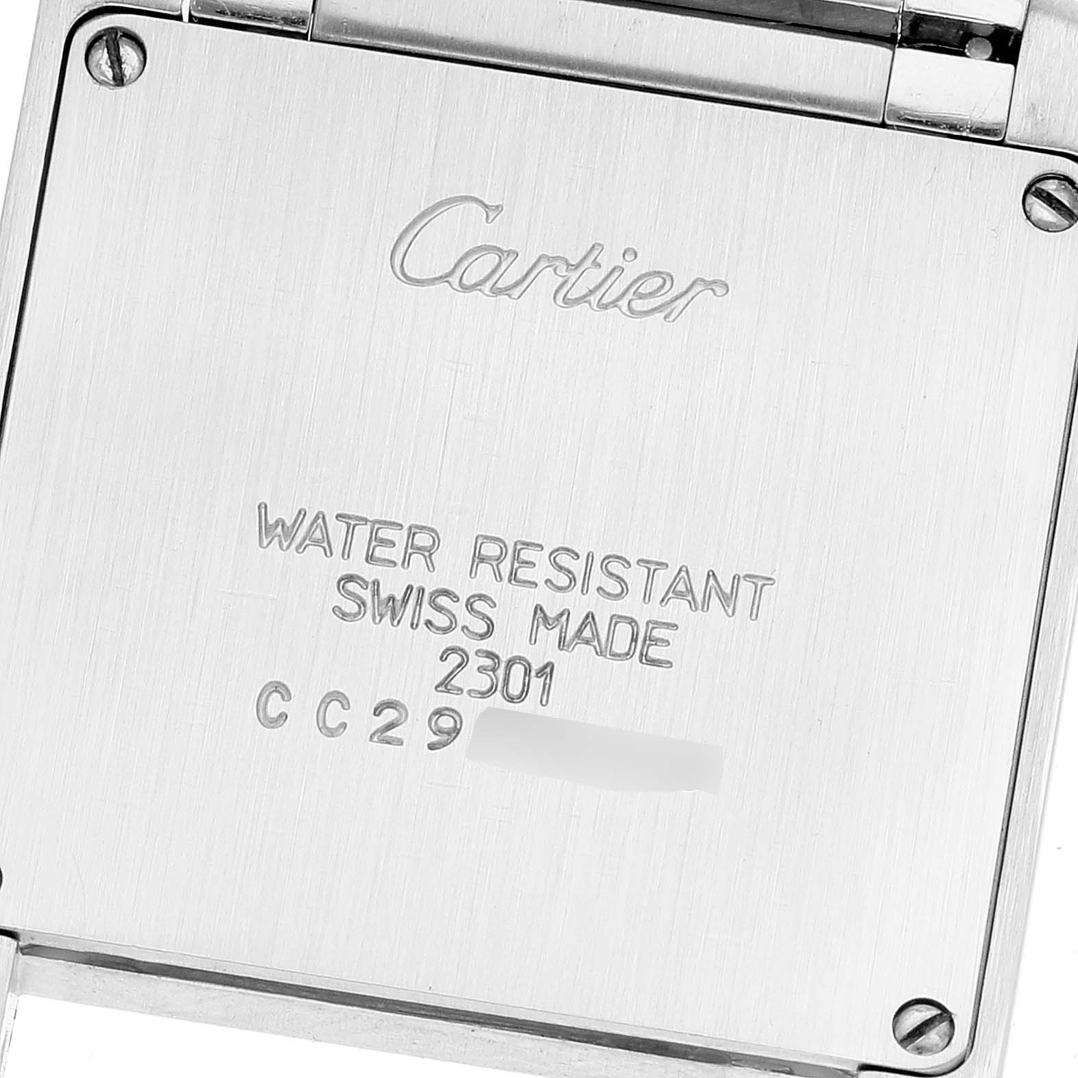This image shows the back case of a Cartier Tank Française watch, displaying the brand logo, water resistance, and manufacturing details.