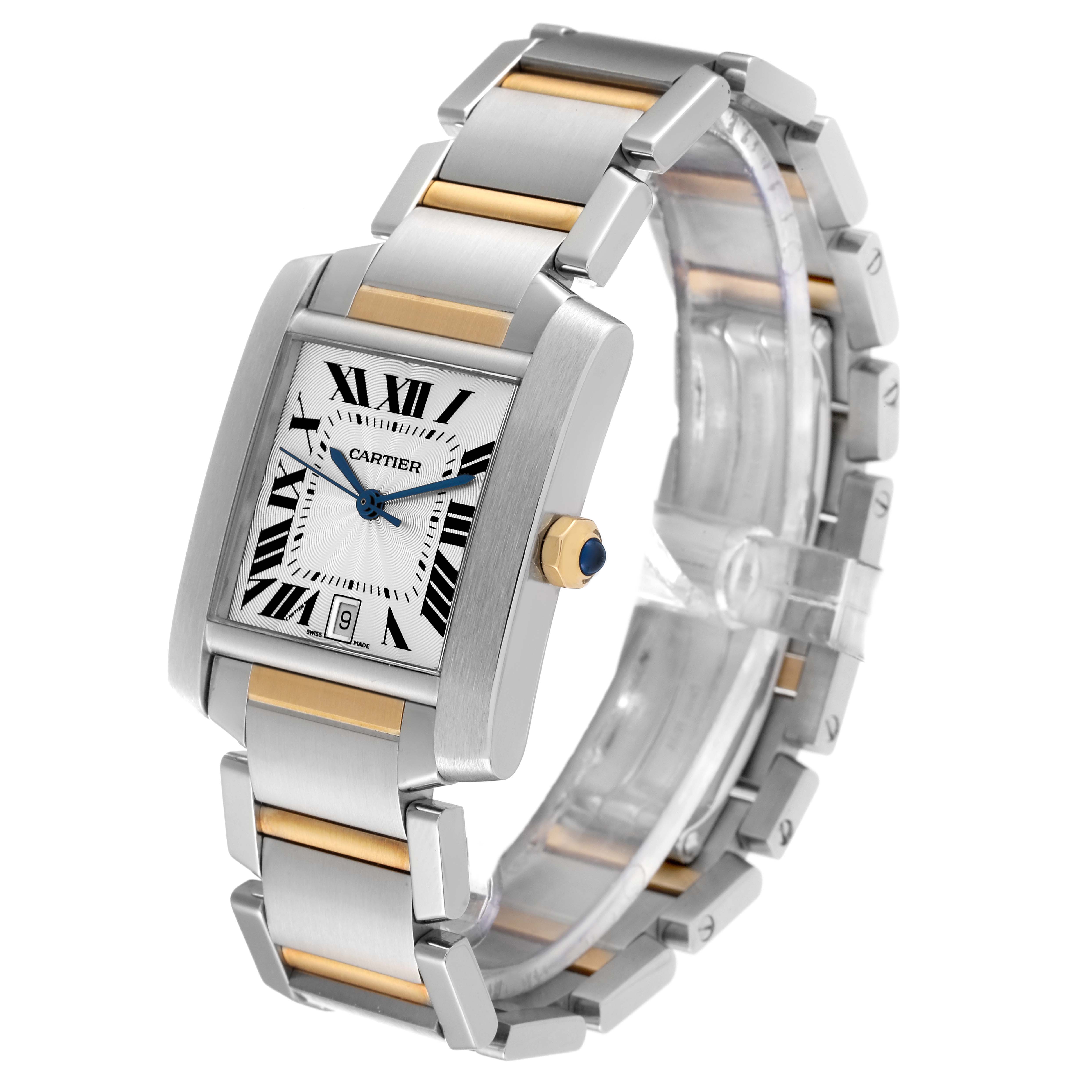 The Cartier Tank Francaise W51005Q4 Men's Steel and Gold (two tone) Silver Dial W51005Q4 Men's Steel and Gold (two tone) Silver Dial watch is shown at a three-quarter angle, highlighting its face, metal bracelet, and blue cabochon crown.