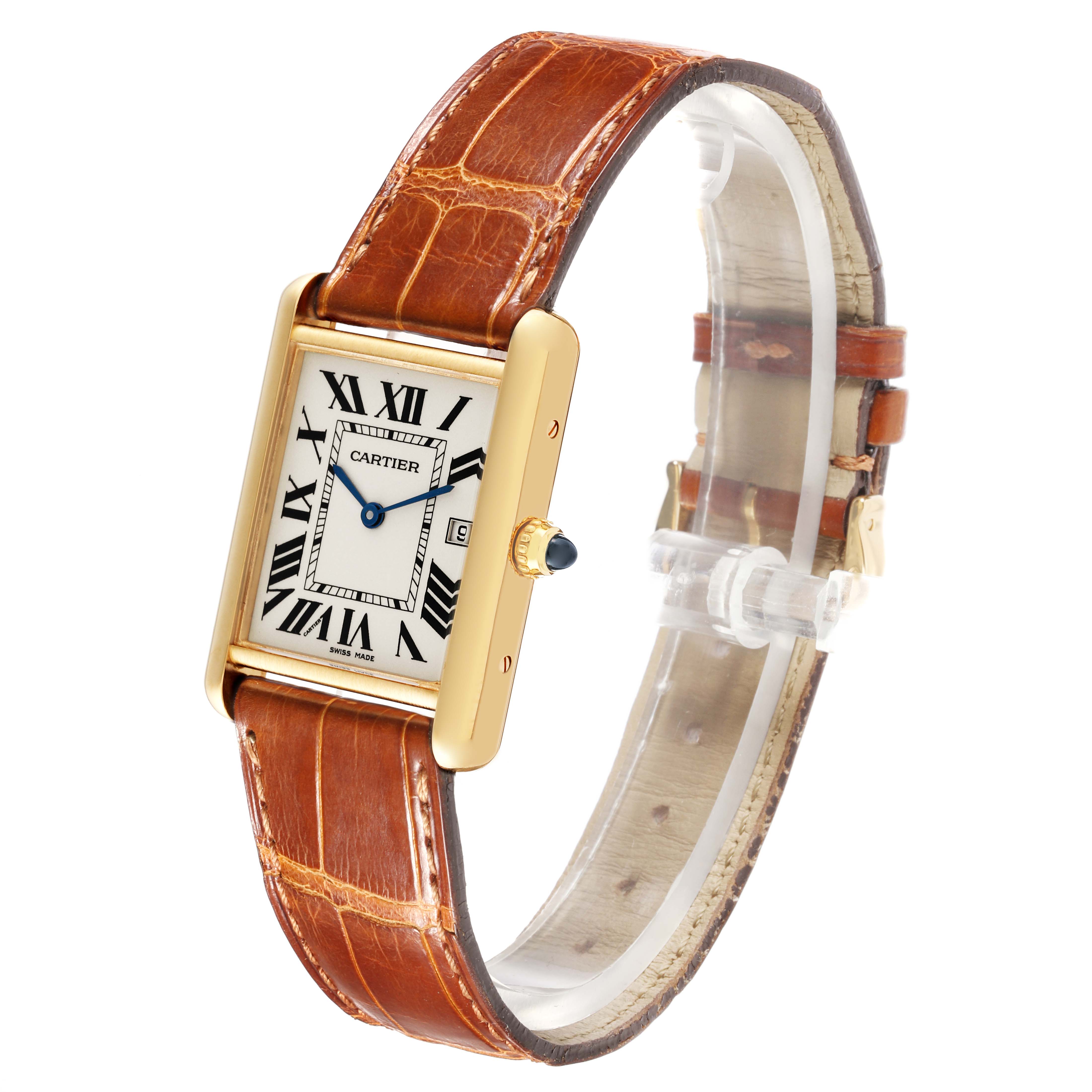 The Cartier Tank Louis W1529756 Men's Yellow Gold Silver Dial W1529756 Men's Yellow Gold Silver Dial watch is shown at an angle displaying its face, crown, and leather strap.