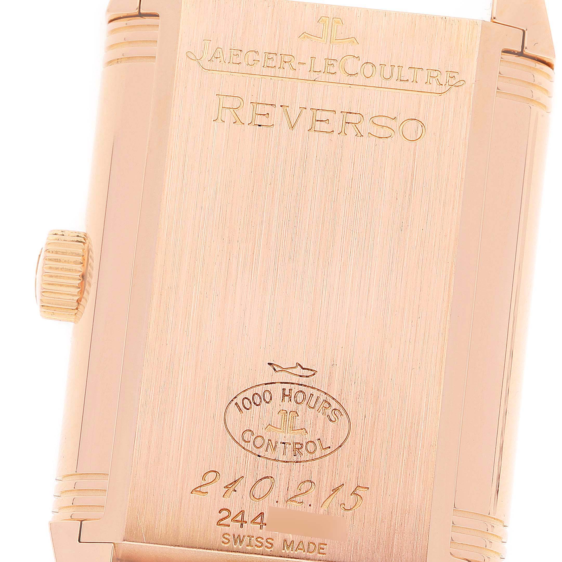 This image shows the back case and crown of a Jaeger-LeCoultre Reverso watch.