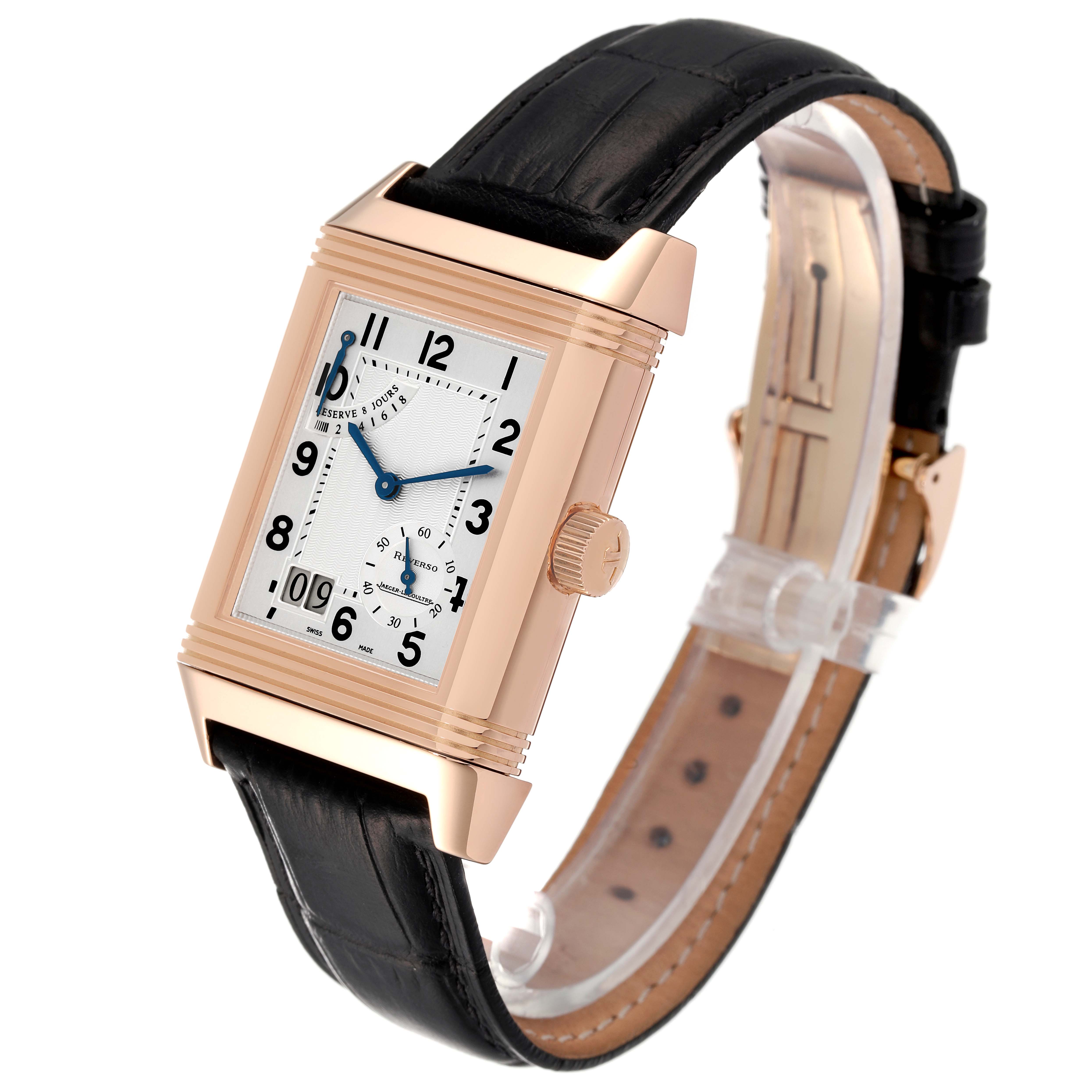 This Jaeger LeCoultre Reverso Q3002401 Men's Rose Gold Silver Dial Q3002401 Men's Rose Gold Silver Dial model watch is shown at an angled view highlighting its face, crown, and leather strap.
