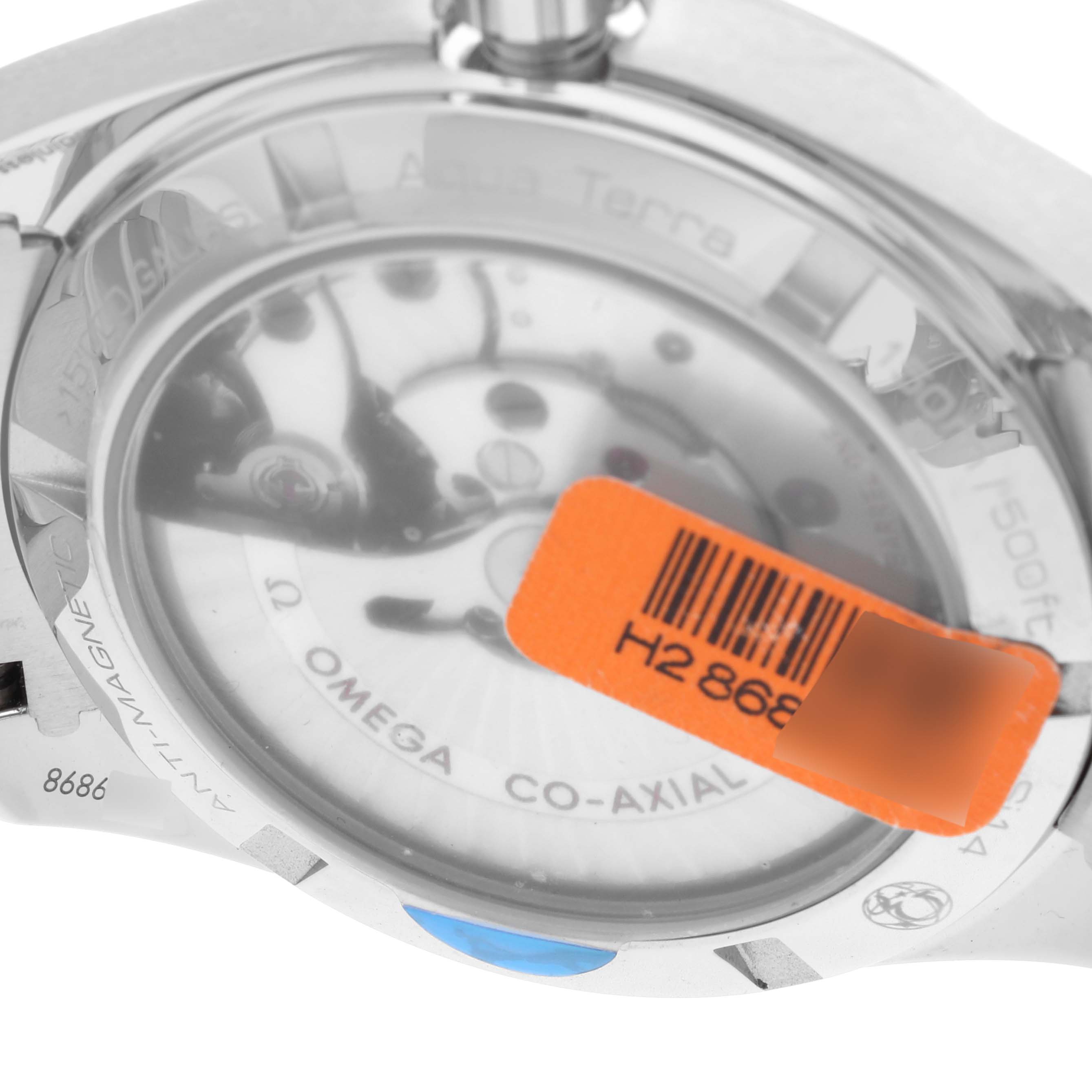 The image shows the back casing of the Omega Aqua Terra 231.15.39.21.55.001 Men's Stainless Steel Mother of Pearl Dial 231.15.39.21.55.001 Men's Stainless Steel Mother of Pearl Dial watch, highlighting its co-axial movement.