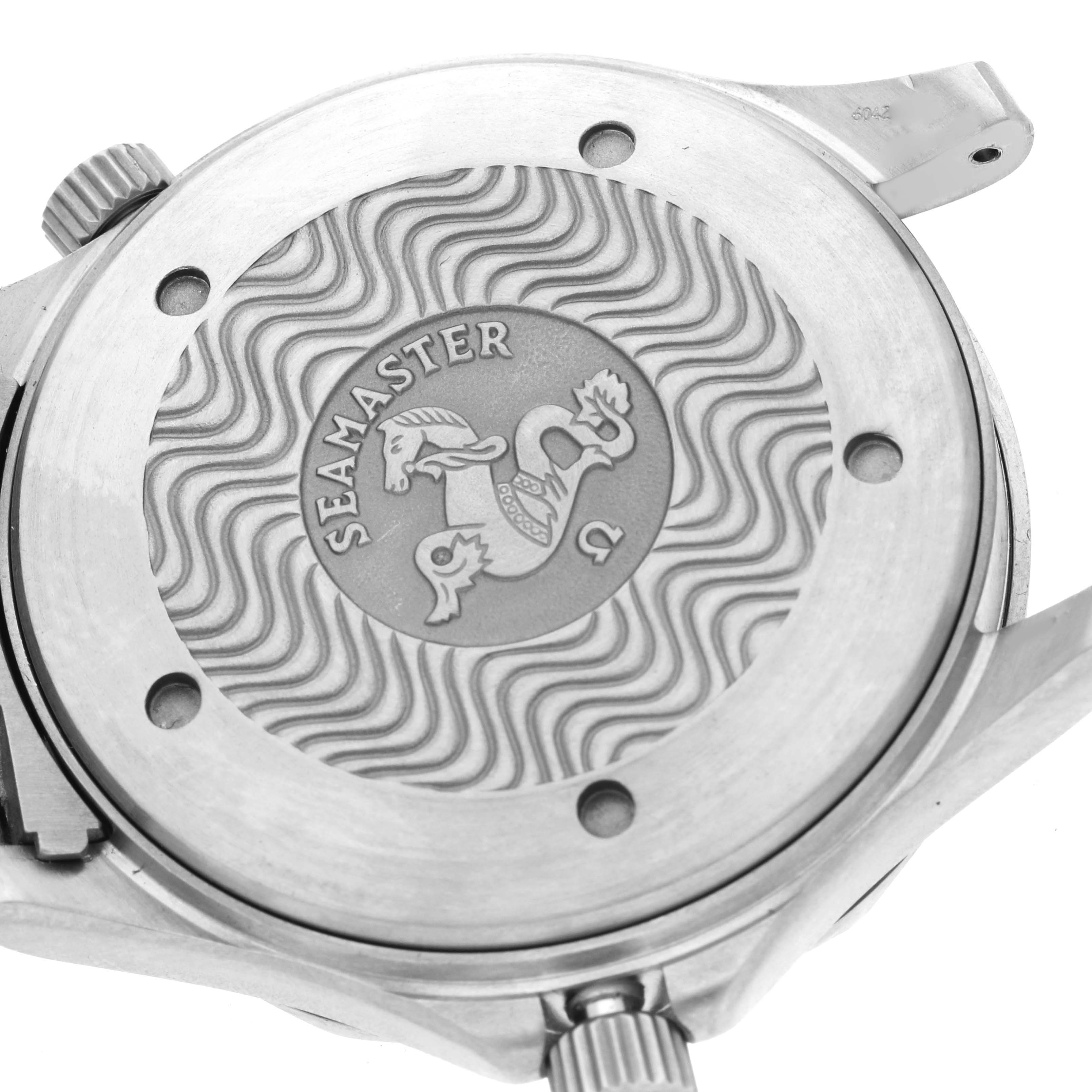 The image shows the back case of the Omega Seamaster 2231.80.00 Men's Titanium Blue Dial 2231.80.00 Men's Titanium Blue Dial, featuring engraving with its logo.