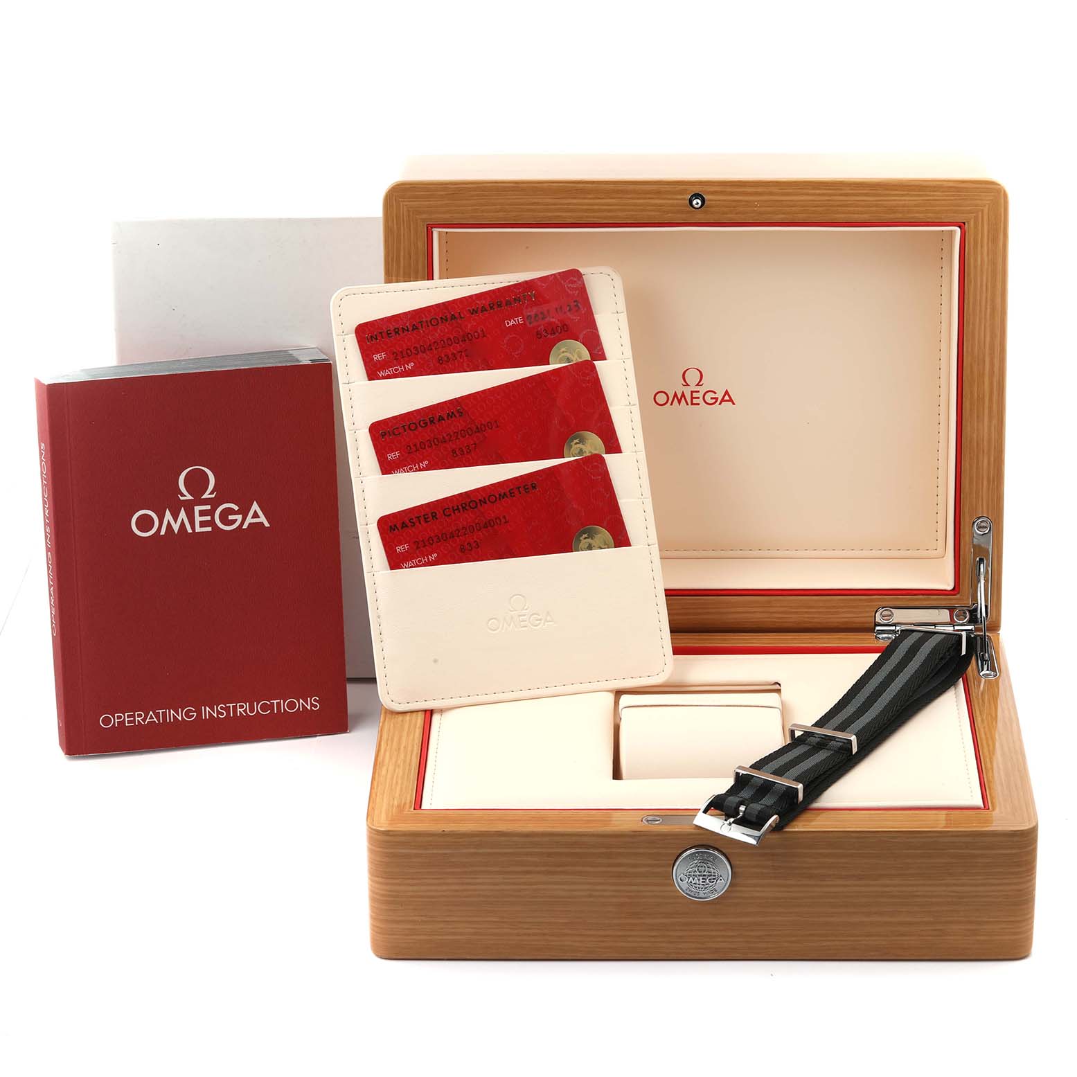 The Omega Seamaster 210.30.42.20.04.001 Men
s Stainless Steel White Dial 210.30.42.20.04.001 Men
s Stainless Steel White Dial accessories include a wooden box, instruction manual, warranty cards, and a black watch strap.