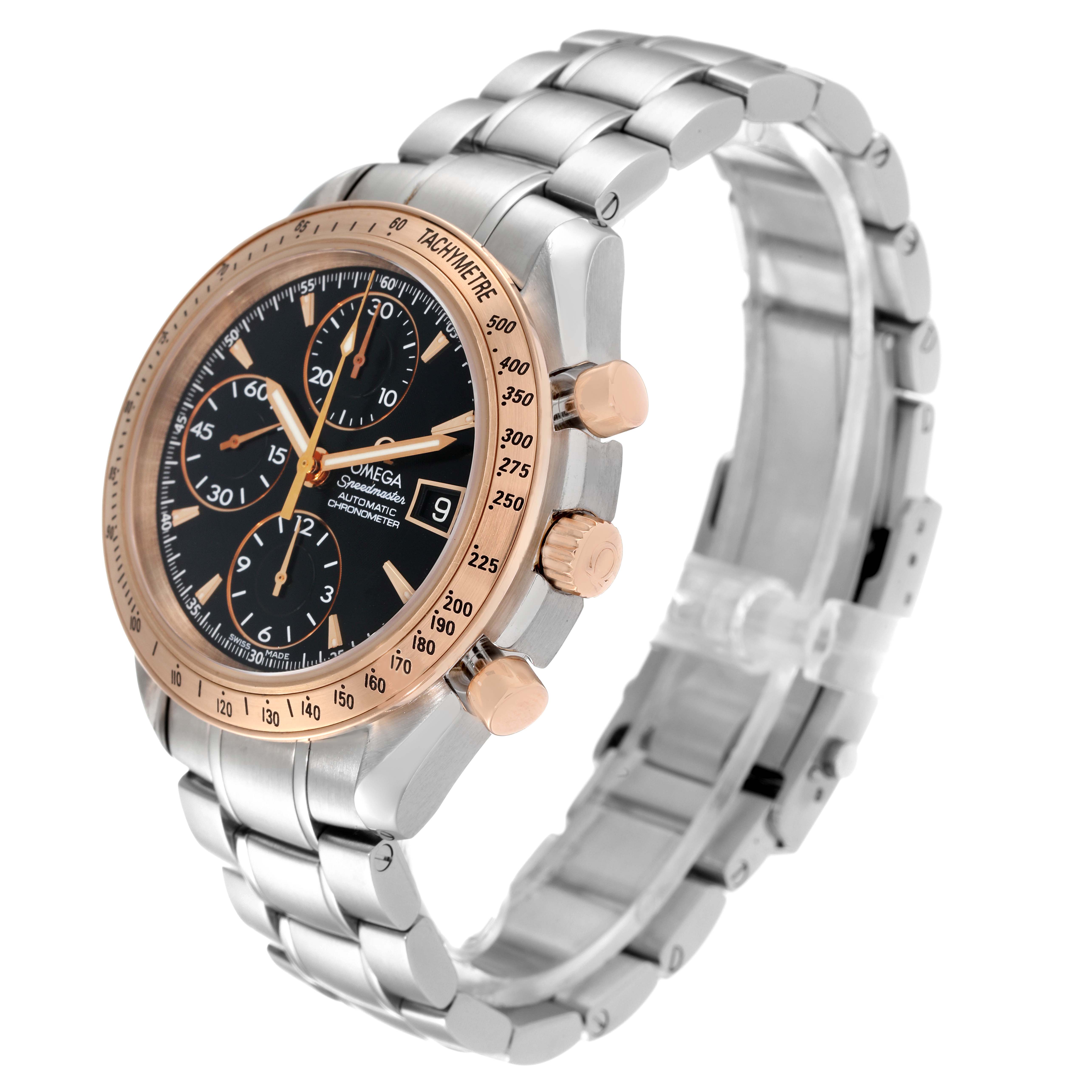 This is a side-angle view of an Omega Speedmaster 323.21.40.40.01.001 Men's Steel and Gold (two tone) Black Dial 323.21.40.40.01.001 Men's Steel and Gold (two tone) Black Dial watch, showcasing its face, bezel, three sub-dials, crown, pushers, and the bracelet.