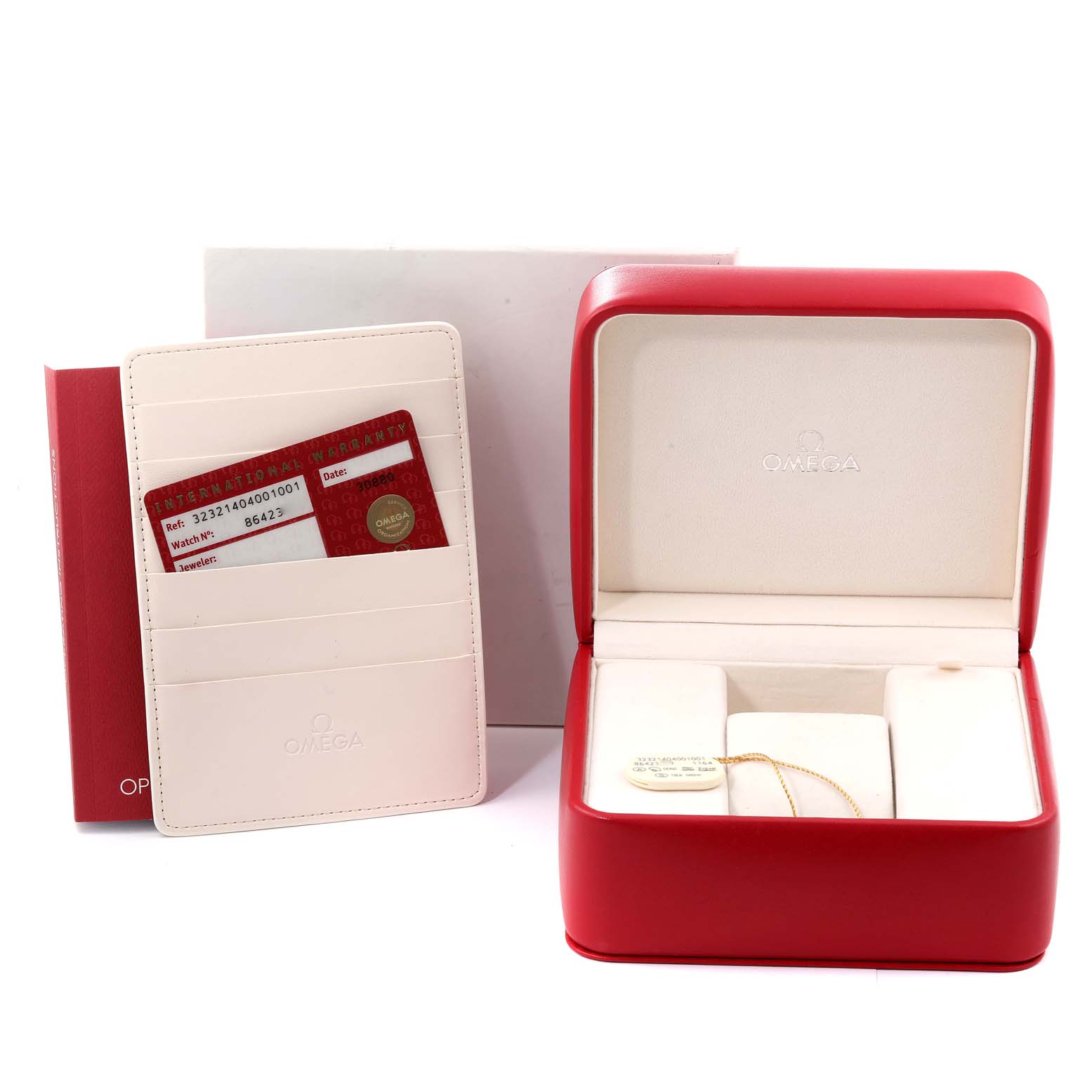 The image shows an Omega Speedmaster 323.21.40.40.01.001 Men's Steel and Gold (two tone) Black Dial 323.21.40.40.01.001 Men's Steel and Gold (two tone) Black Dial watch box, warranty card holder with card, and the instruction manual, all viewed from the front.