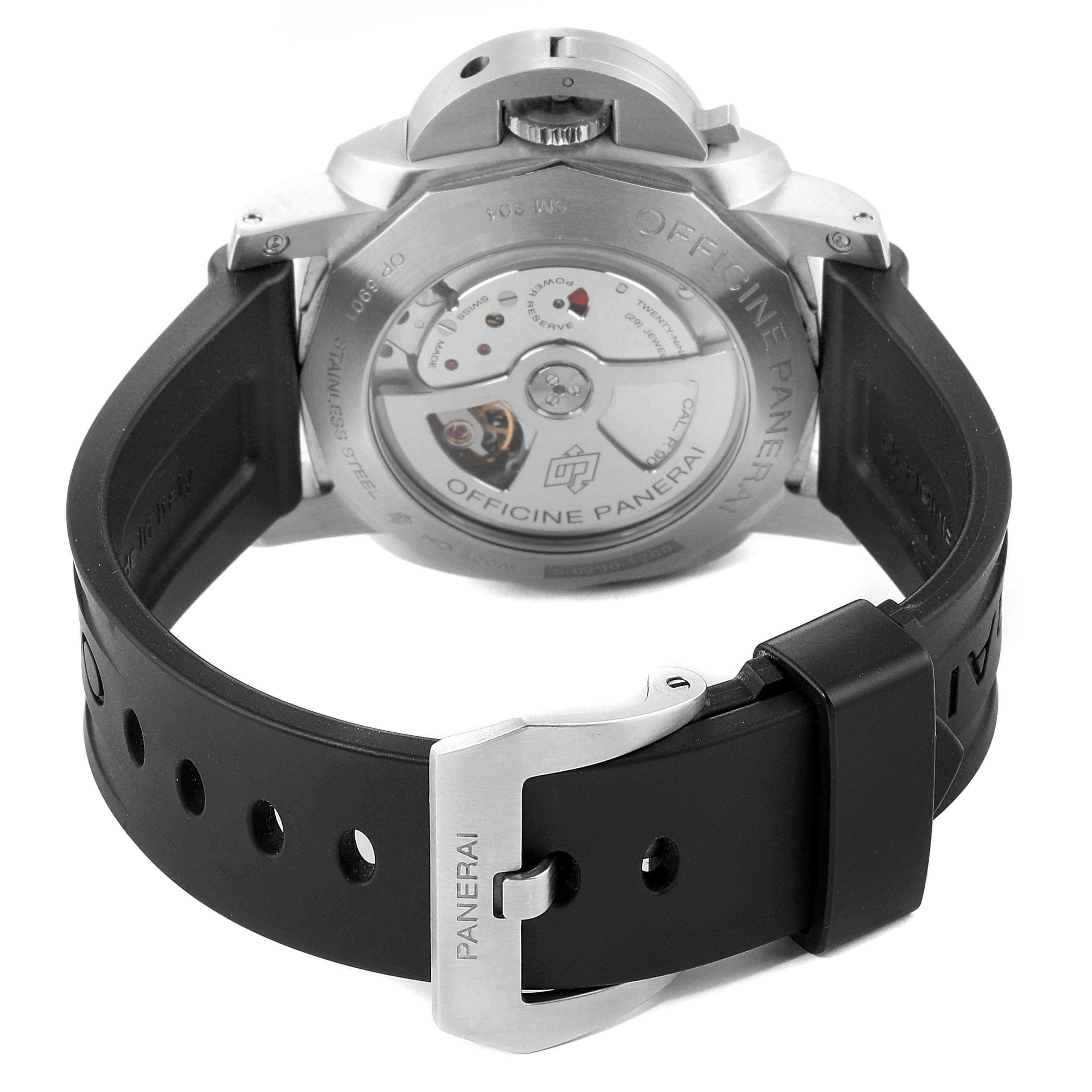 The image shows the back of a Panerai Luminor PAM00320 Men's Stainless Steel Black Dial PAM00320 Men's Stainless Steel Black Dial watch, highlighting the movement and the black rubber strap with a Panerai buckle.